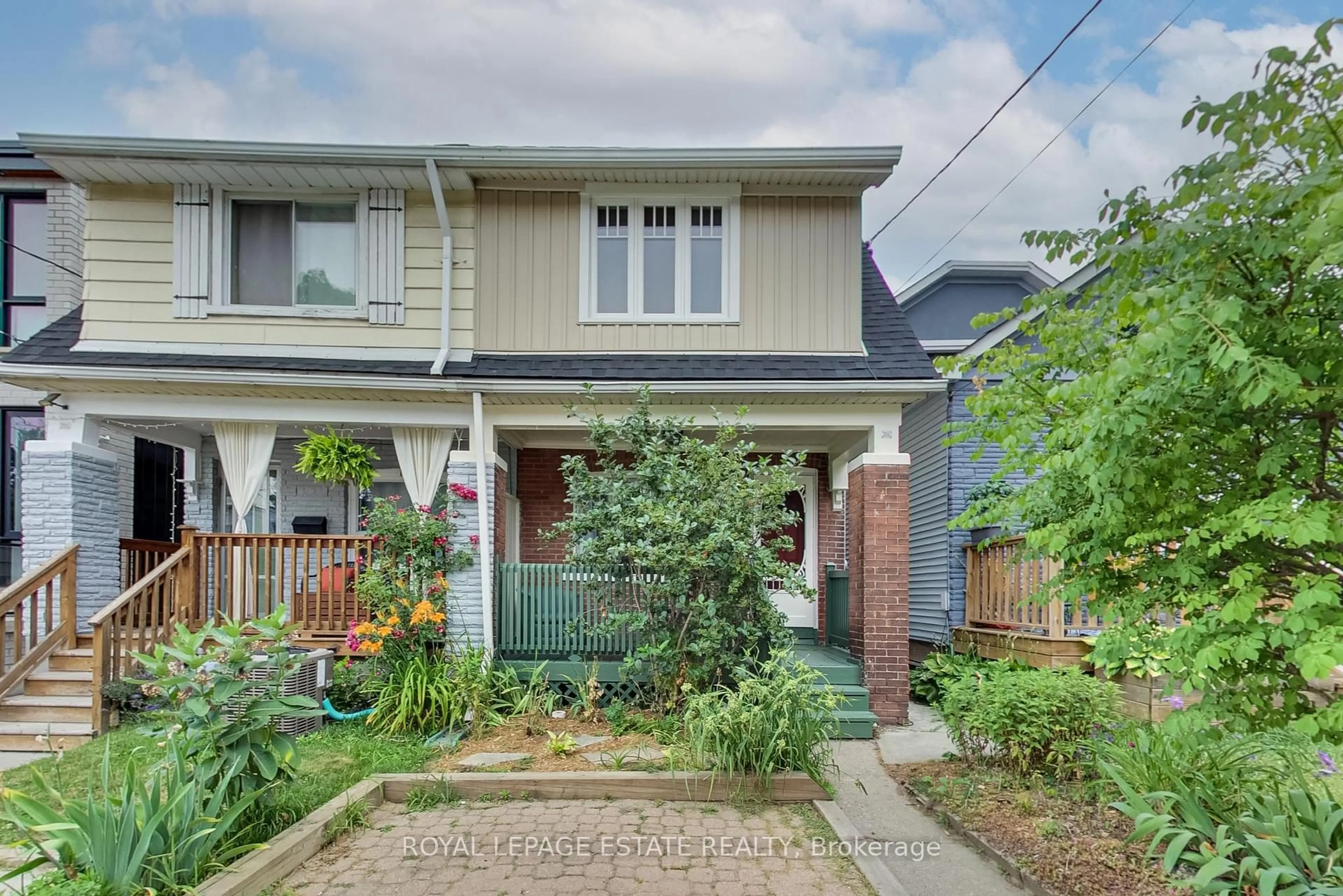 Home with brick exterior material, street for 127 King Edward Ave, Toronto Ontario M4C 5J7