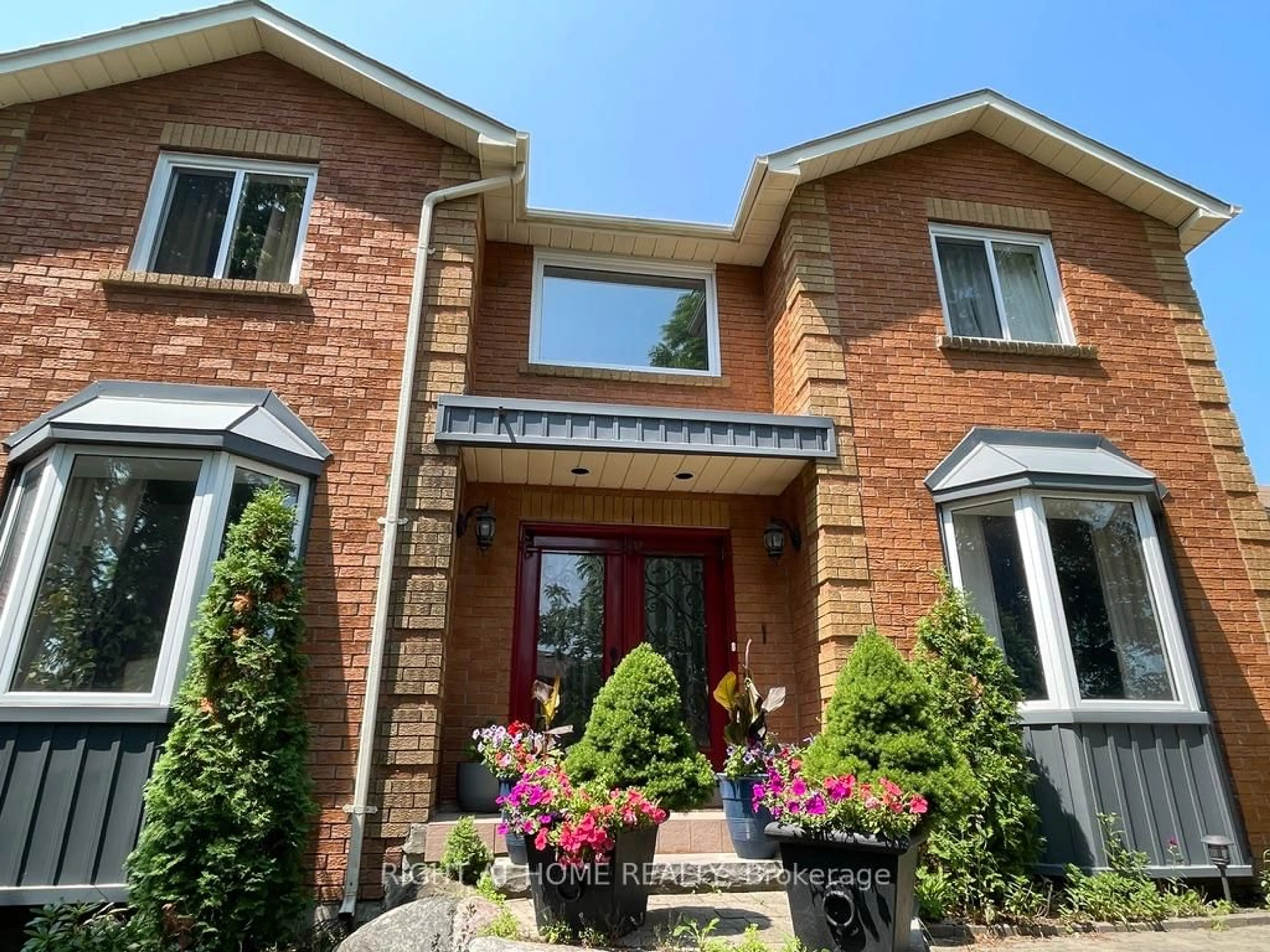 Home with brick exterior material, street for 1689 Major Oaks Rd, Pickering Ontario L1X 1X1