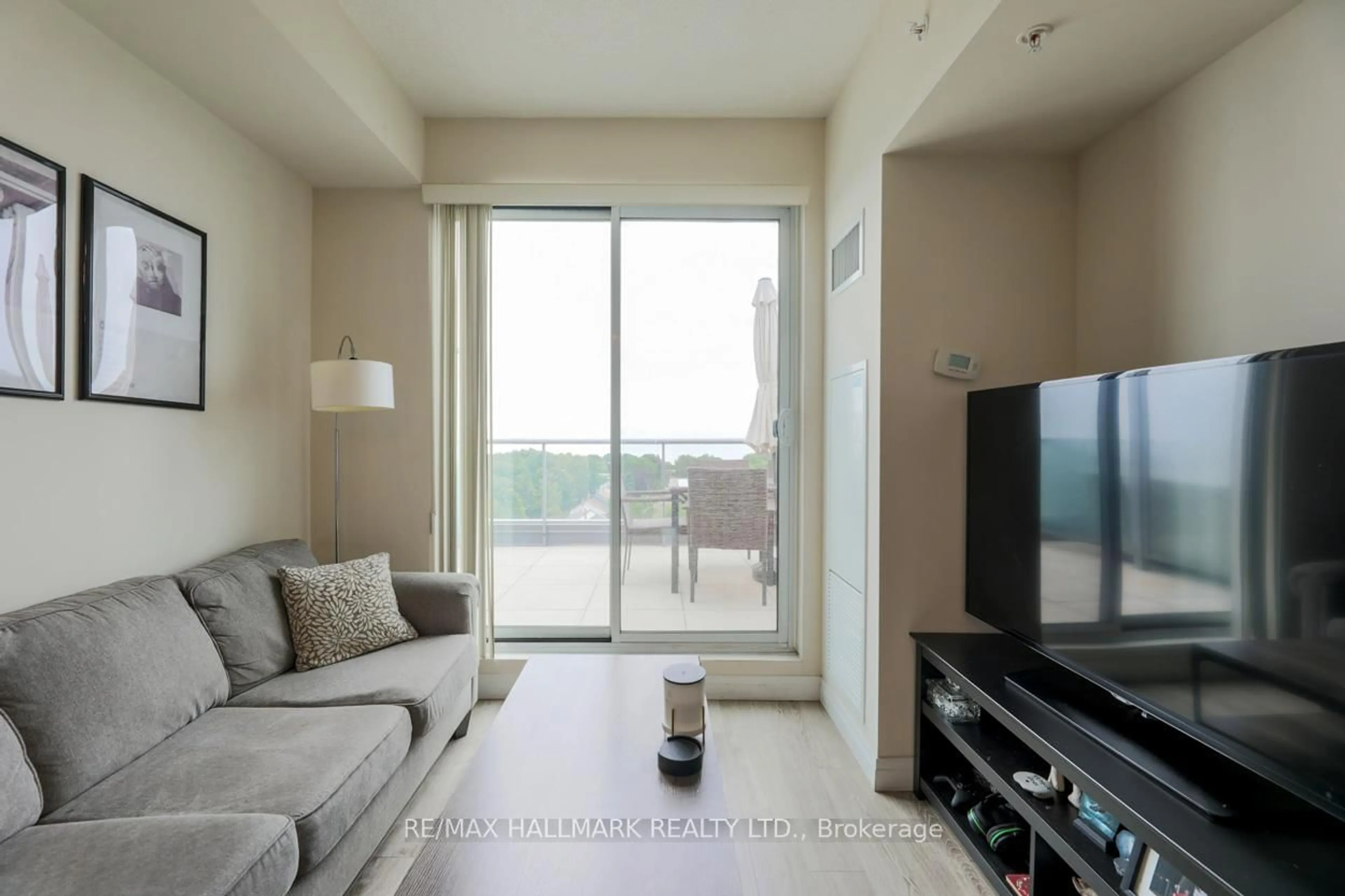 Living room with furniture, unknown for 22 East Haven Dr #818, Toronto Ontario M1N 1L9
