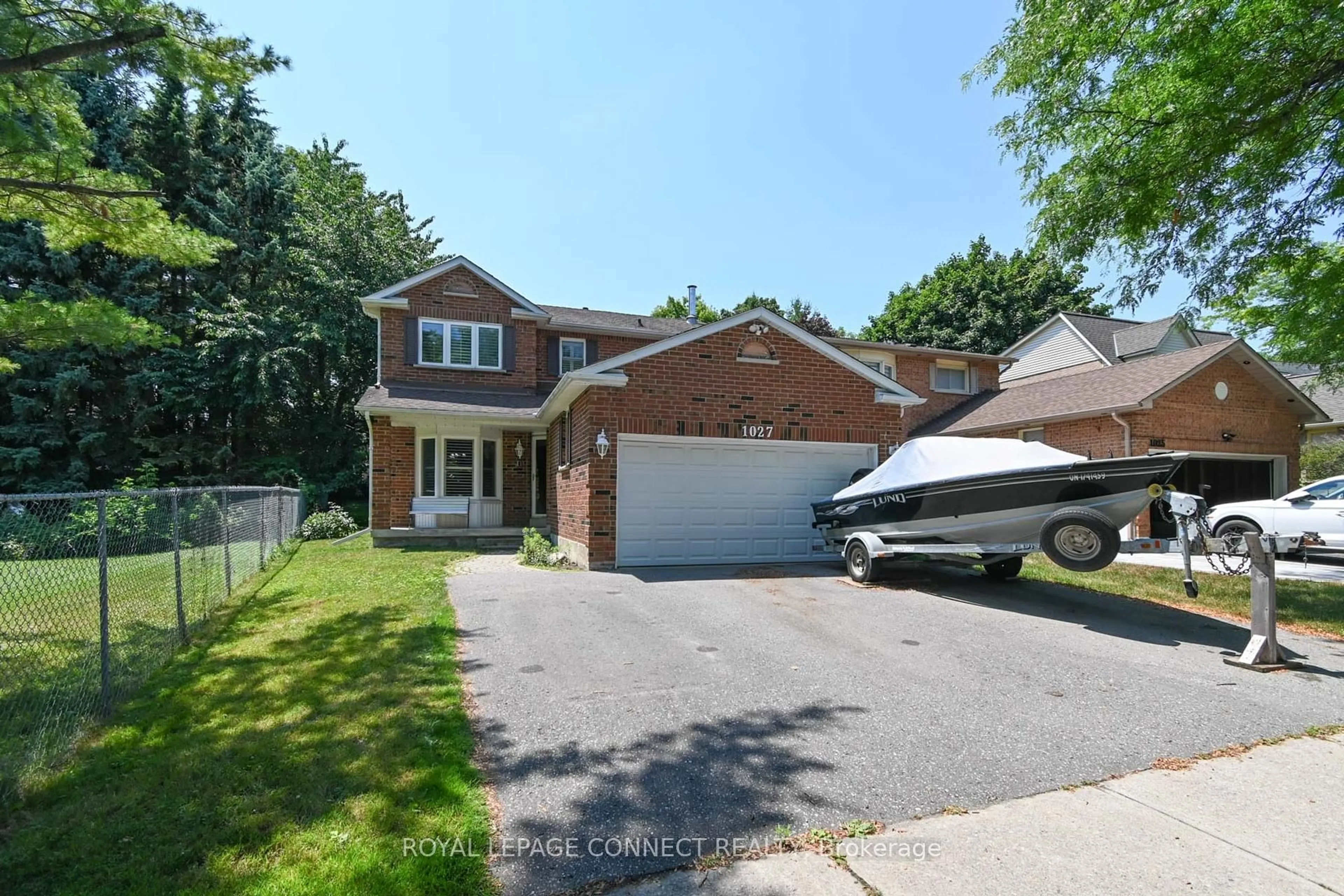 Home with brick exterior material, street for 1027 Benton Cres, Pickering Ontario L1X 1M8
