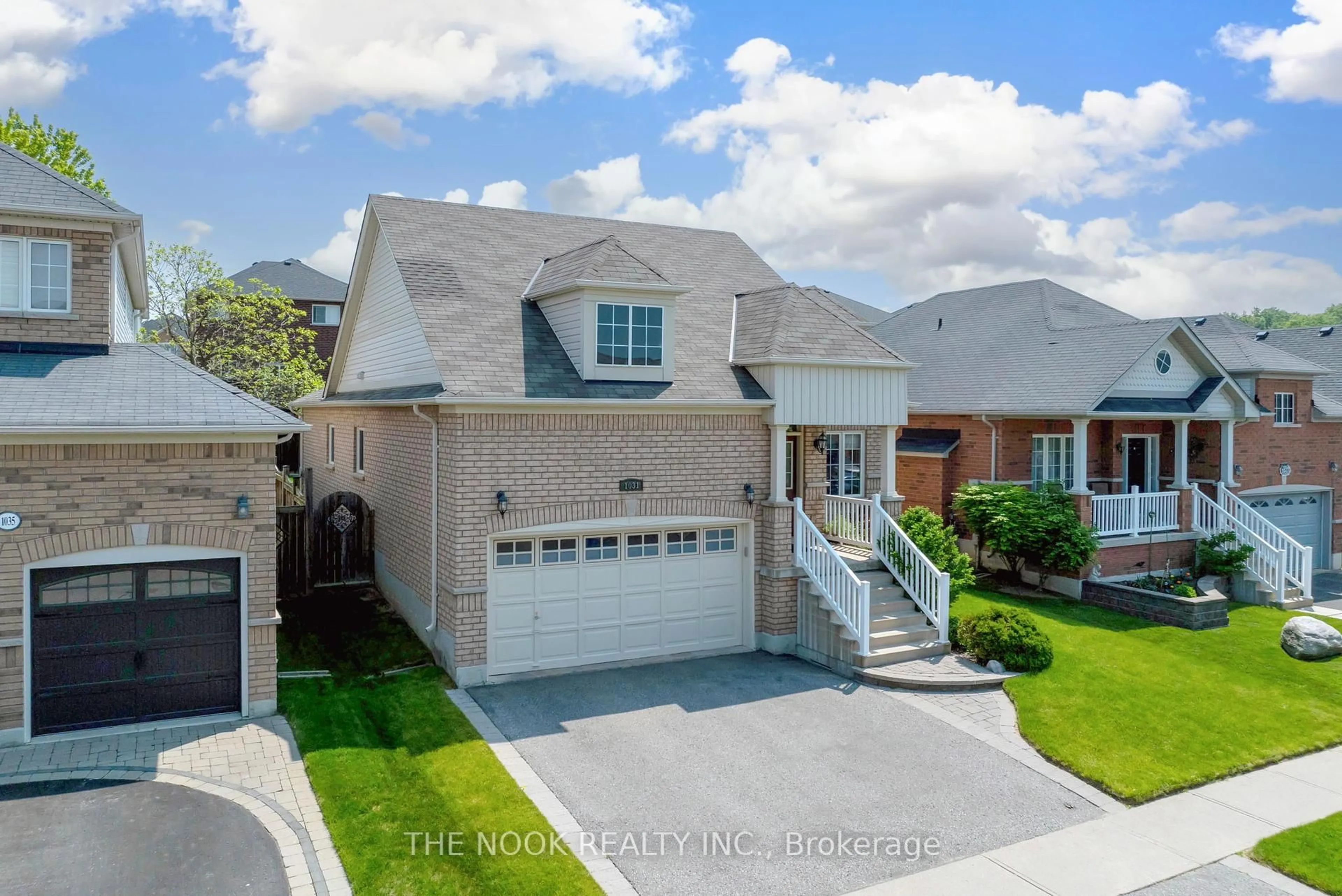 A pic from outside/outdoor area/front of a property/back of a property/a pic from drone, street for 1031 Eagle Ridge Dr, Oshawa Ontario L1K 0C8