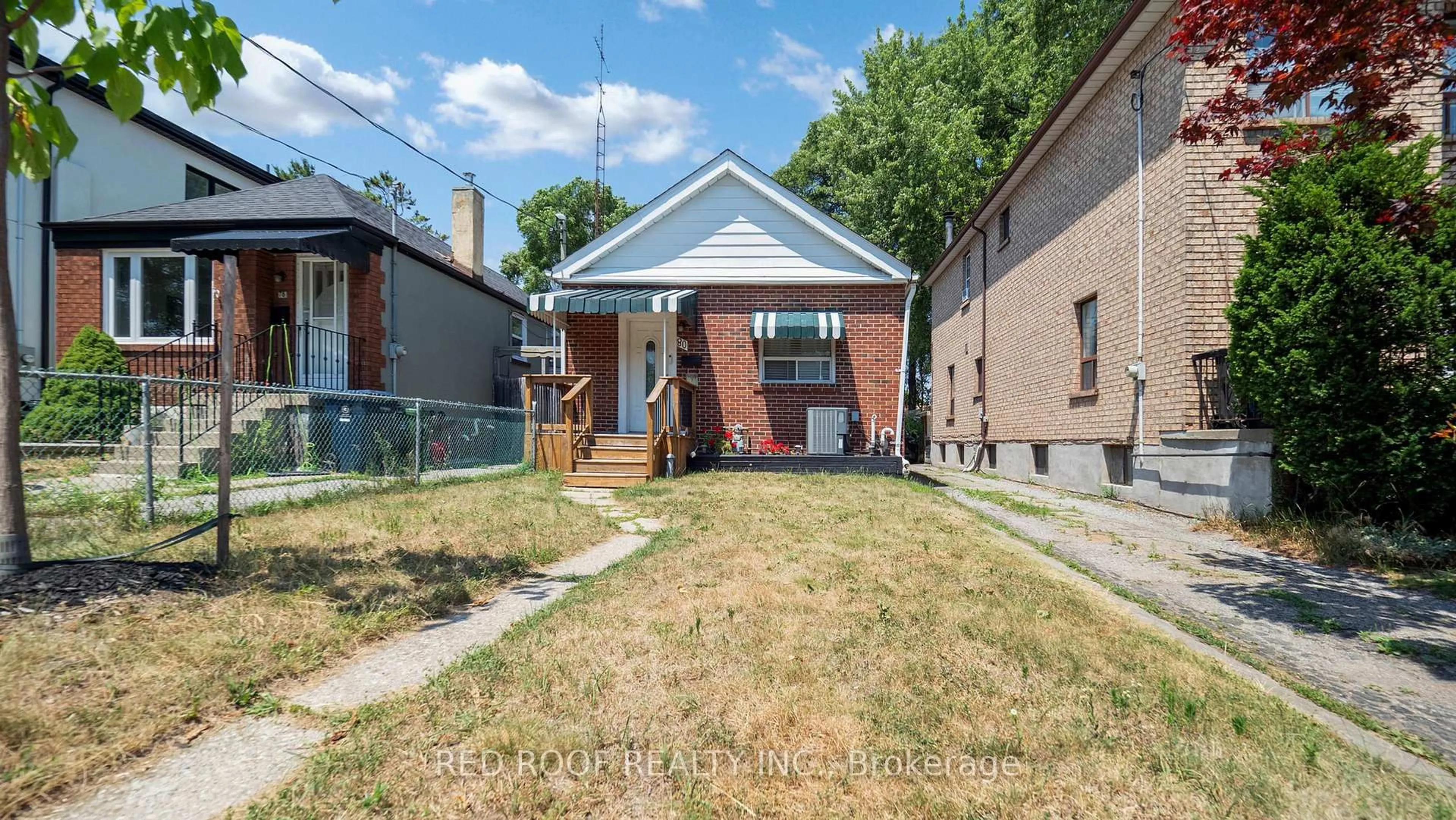Home with brick exterior material, street for 80 Dunkirk Rd, Toronto Ontario M4C 2M6
