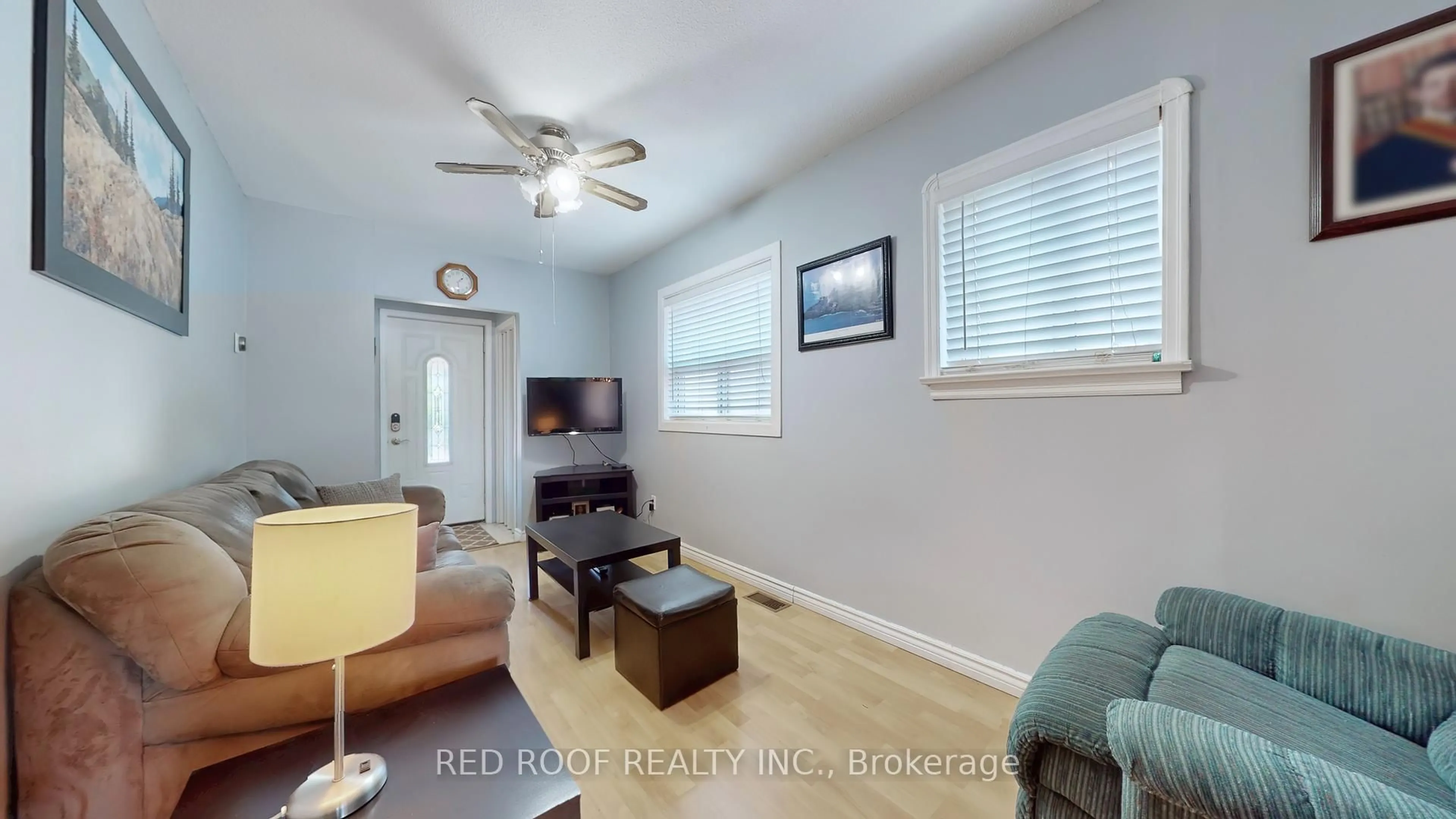 Living room with furniture, wood/laminate floor for 80 Dunkirk Rd, Toronto Ontario M4C 2M6