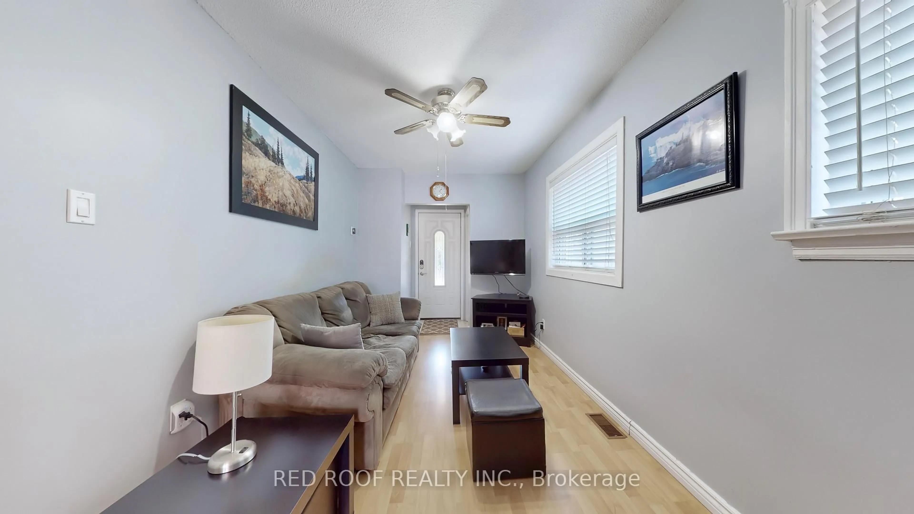 Living room with furniture, wood/laminate floor for 80 Dunkirk Rd, Toronto Ontario M4C 2M6