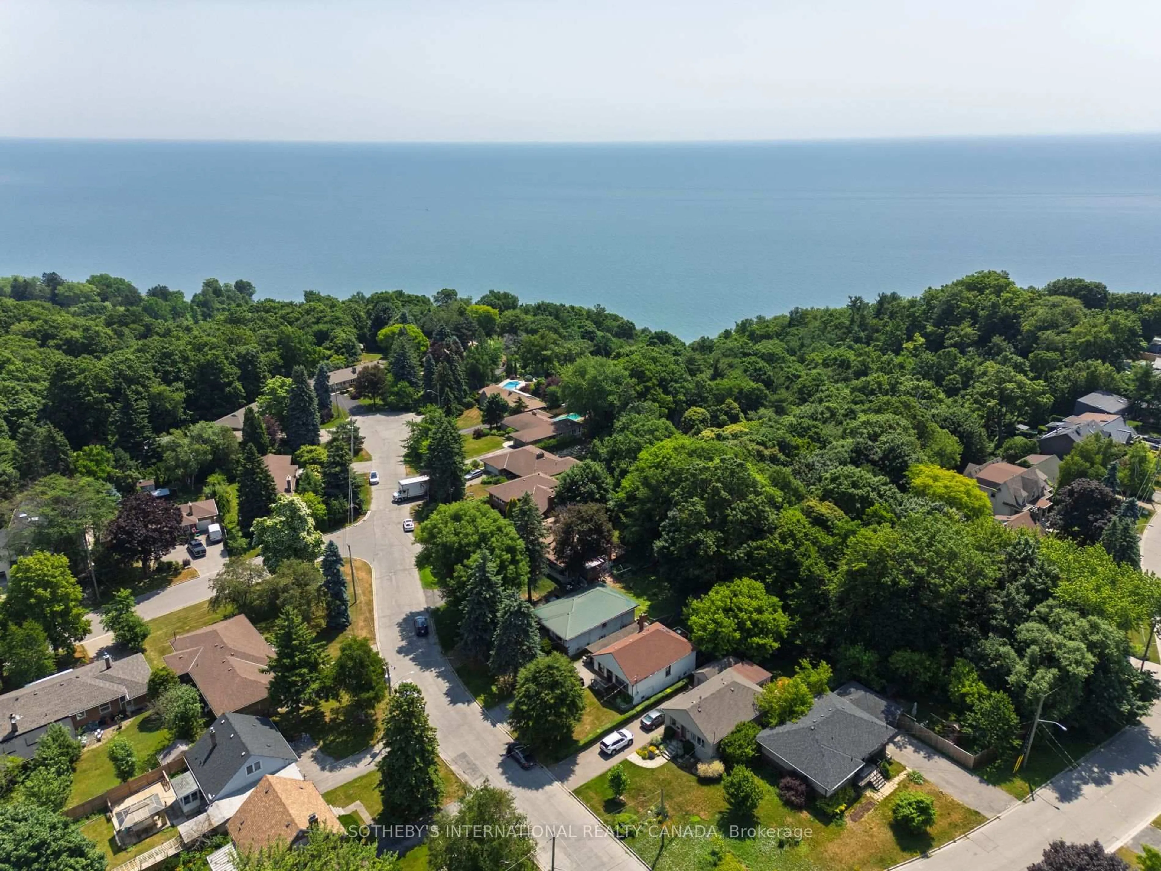 A pic from outside/outdoor area/front of a property/back of a property/a pic from drone, water/lake/river/ocean view for 17 Ayre Point Rd, Toronto Ontario M1M 1G4