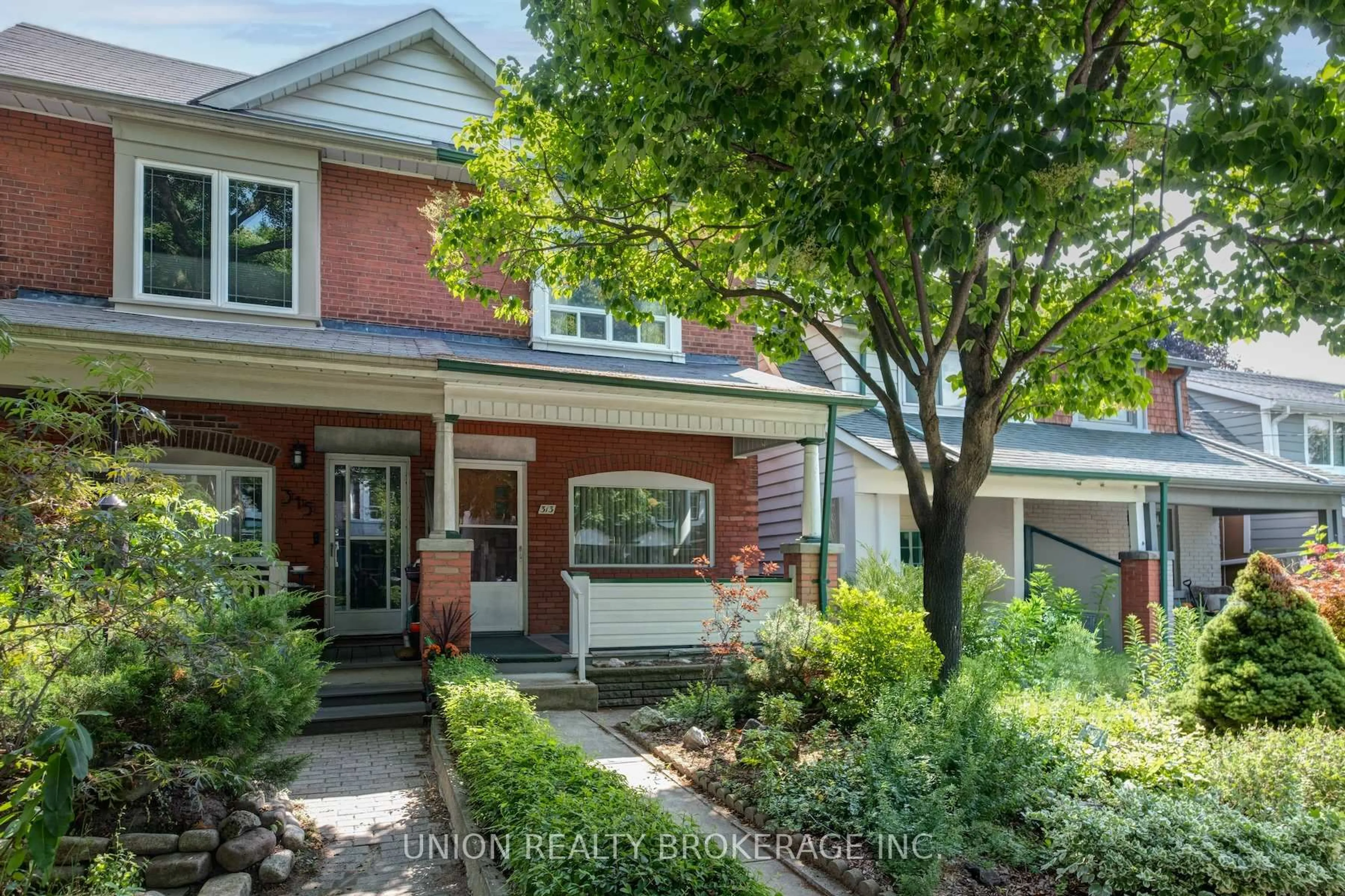 Home with brick exterior material, street for 313 Kenilworth Ave, Toronto Ontario M4L 3S9