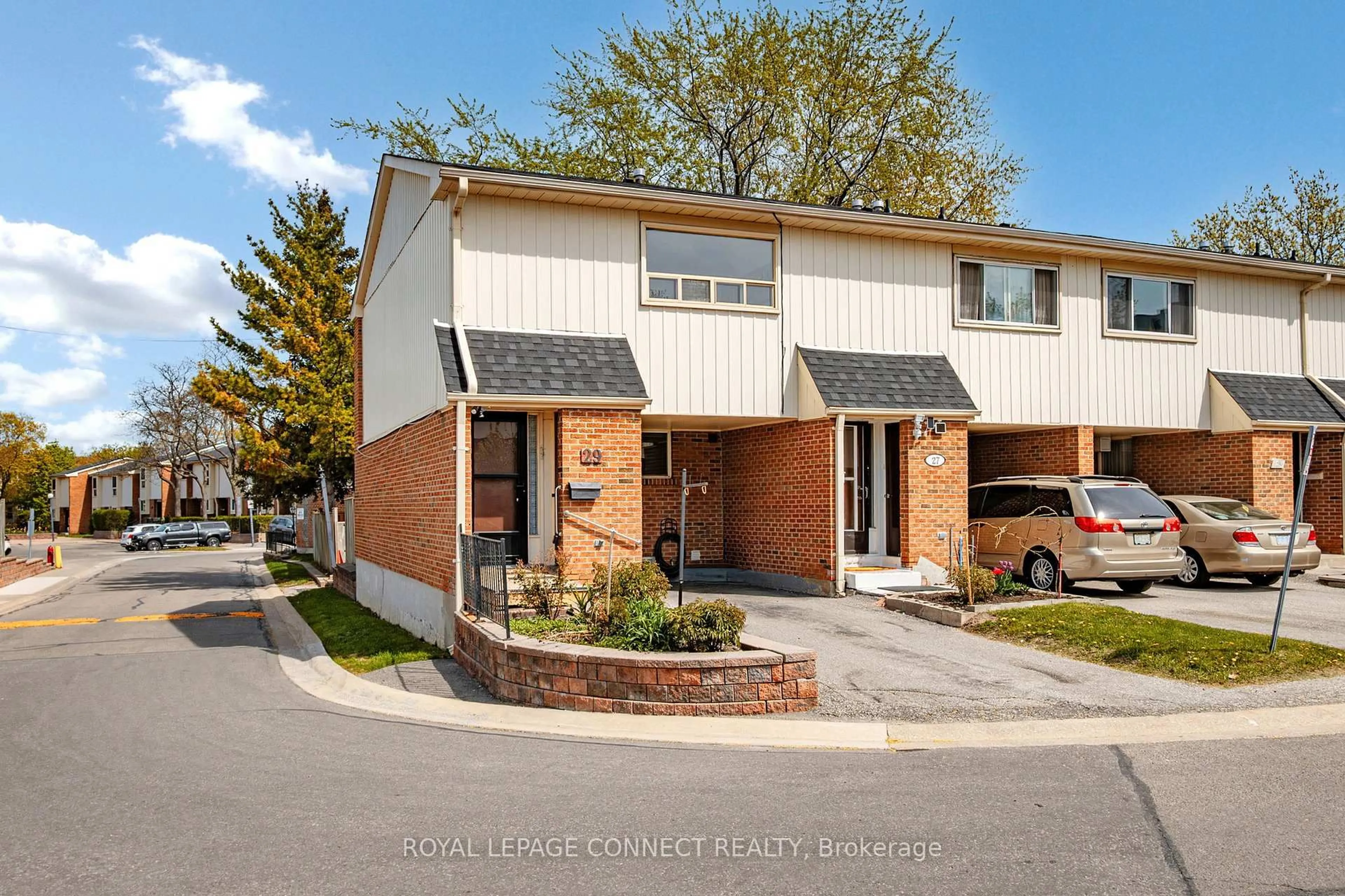 Home with brick exterior material, street for 2451 Bridletowne Circ #29, Toronto Ontario M1W 2Y4