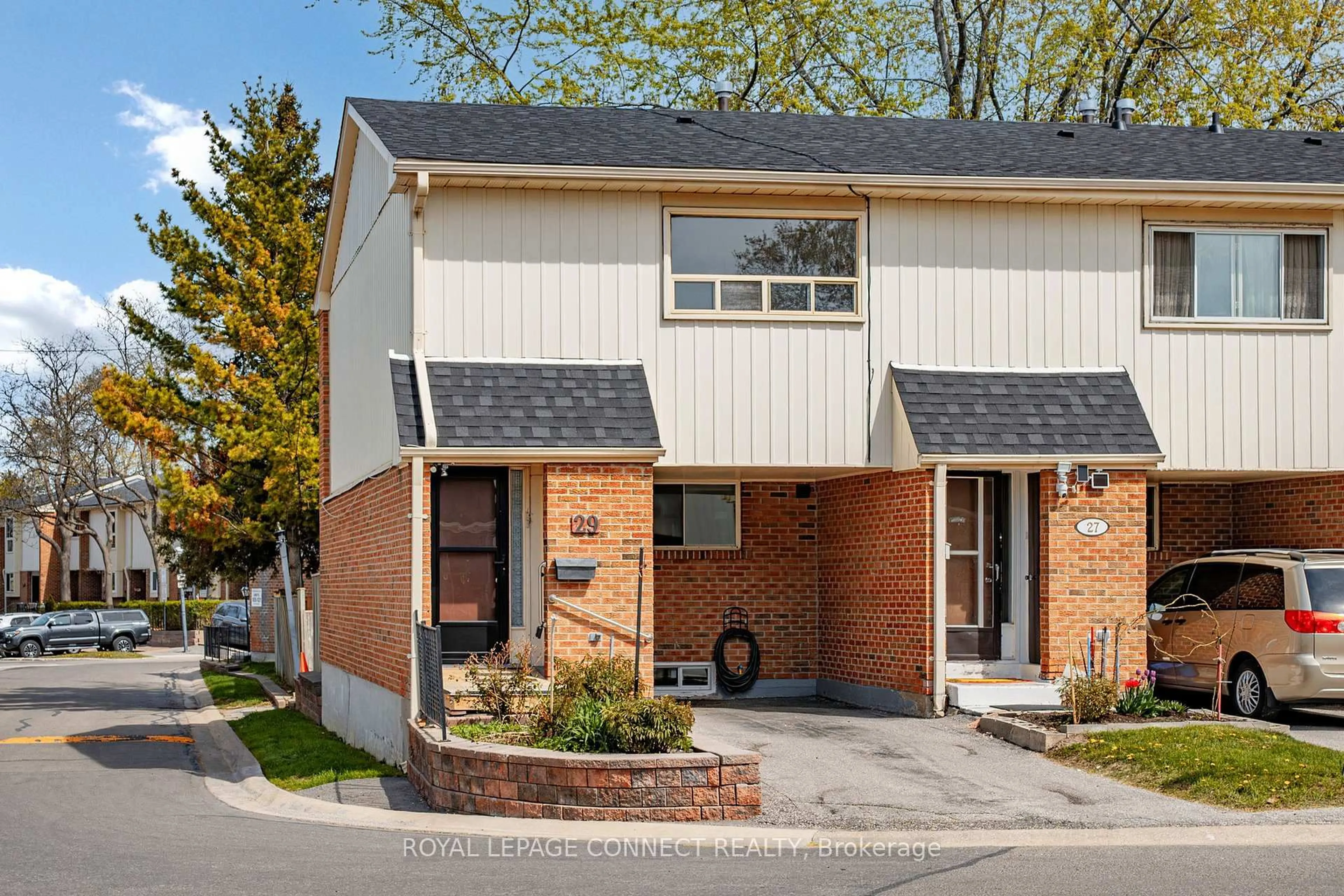 Home with brick exterior material, street for 2451 Bridletowne Circ #29, Toronto Ontario M1W 2Y4