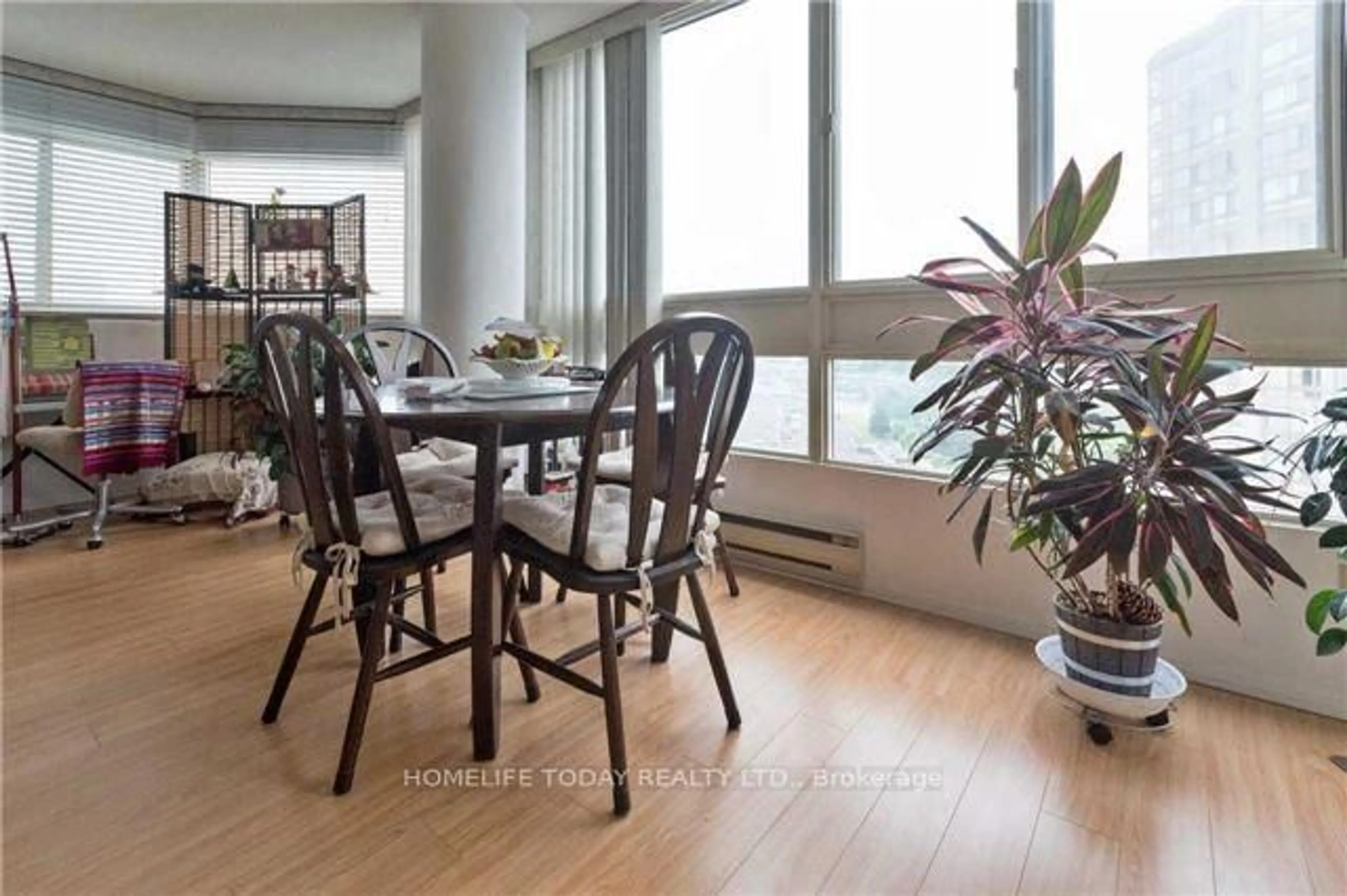 Dining room, wood/laminate floor for 3233 Eglinton Ave #709, Toronto Ontario M1J 3N6