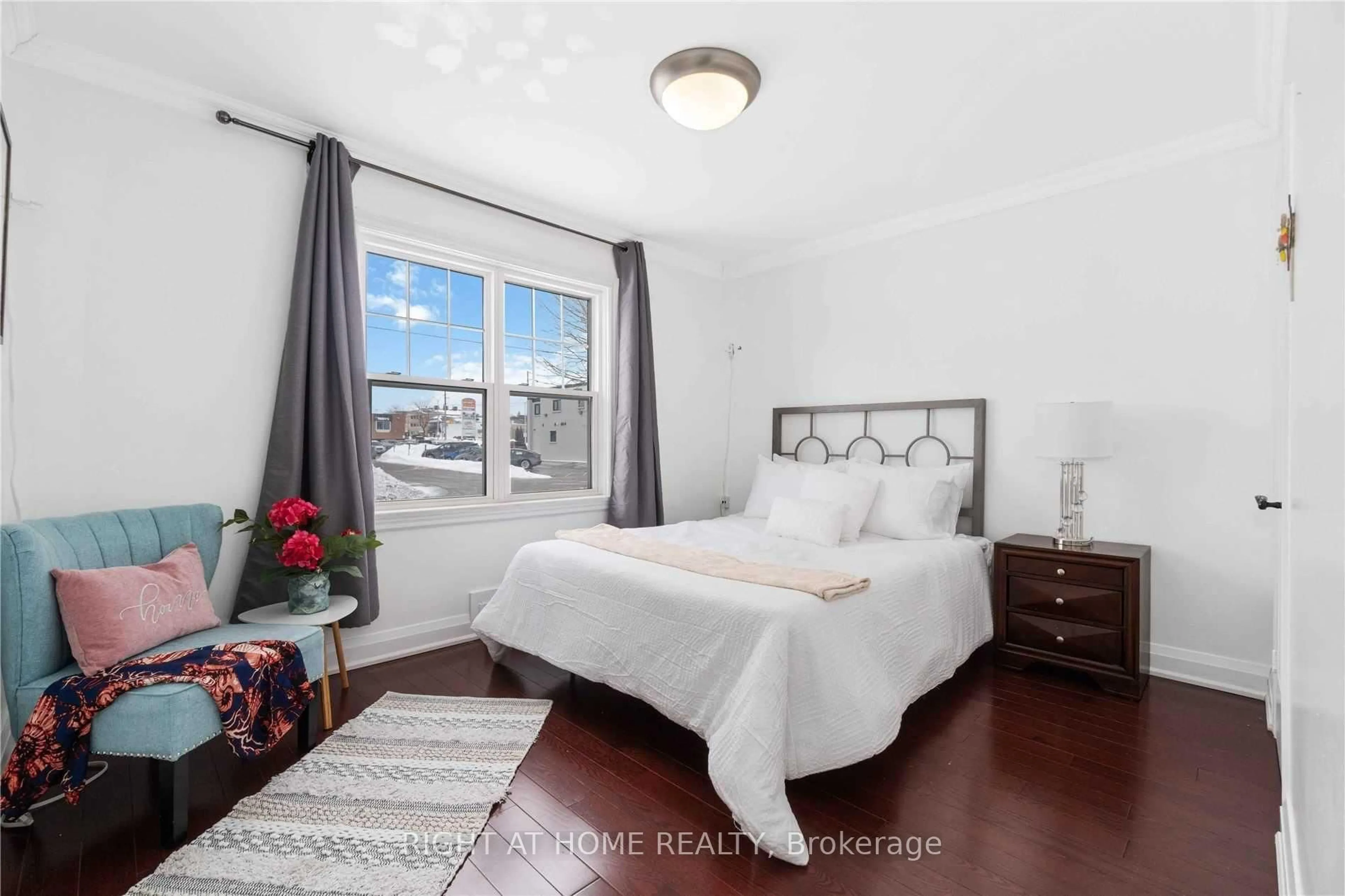 Bedroom with bed, wood/laminate floor for 19 Burk St, Oshawa Ontario L1J 4C1