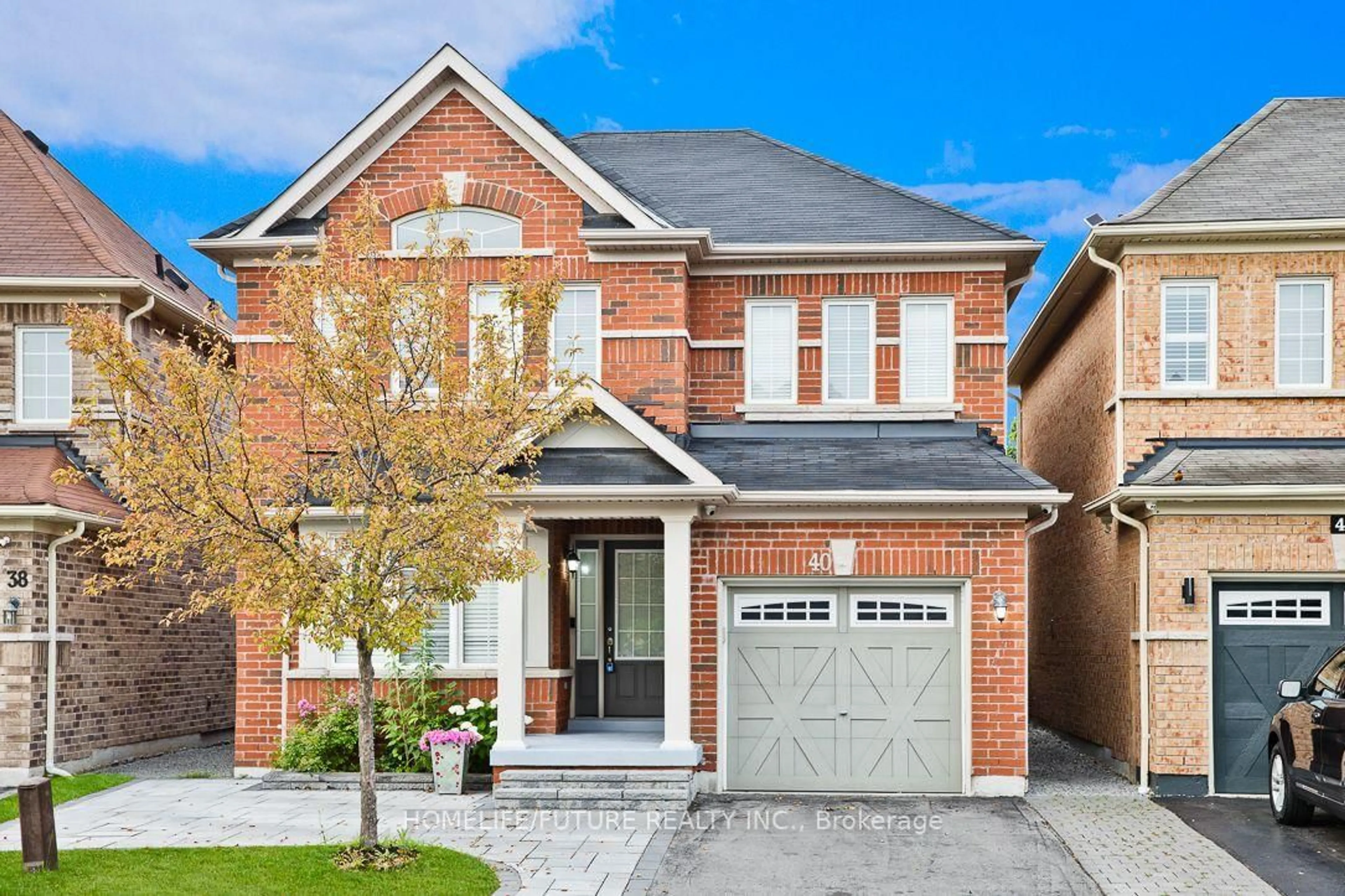 Home with brick exterior material, street for 40 Oswell Dr, Ajax Ontario L1Z 0L4