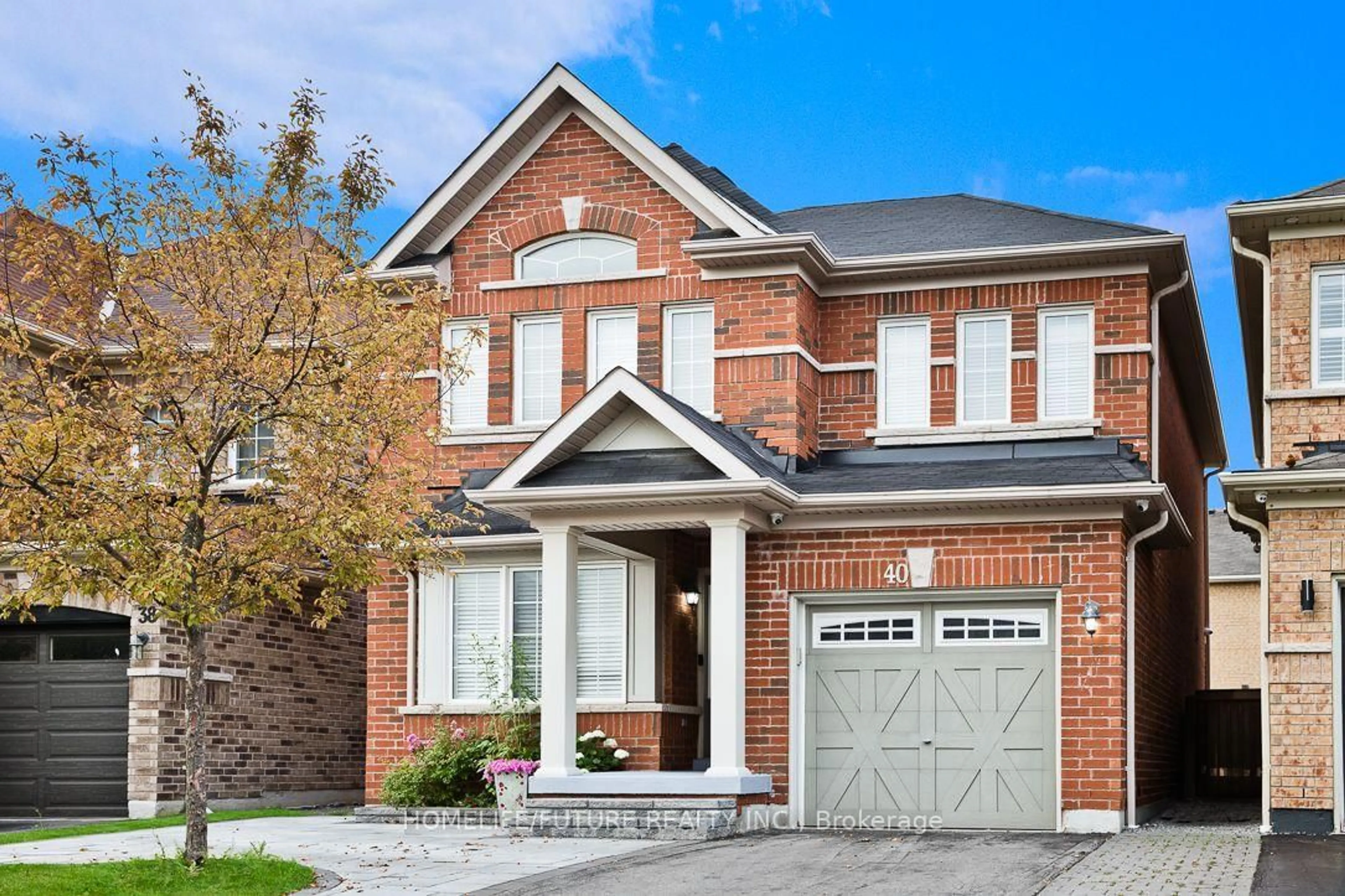 Home with brick exterior material, street for 40 Oswell Dr, Ajax Ontario L1Z 0L4