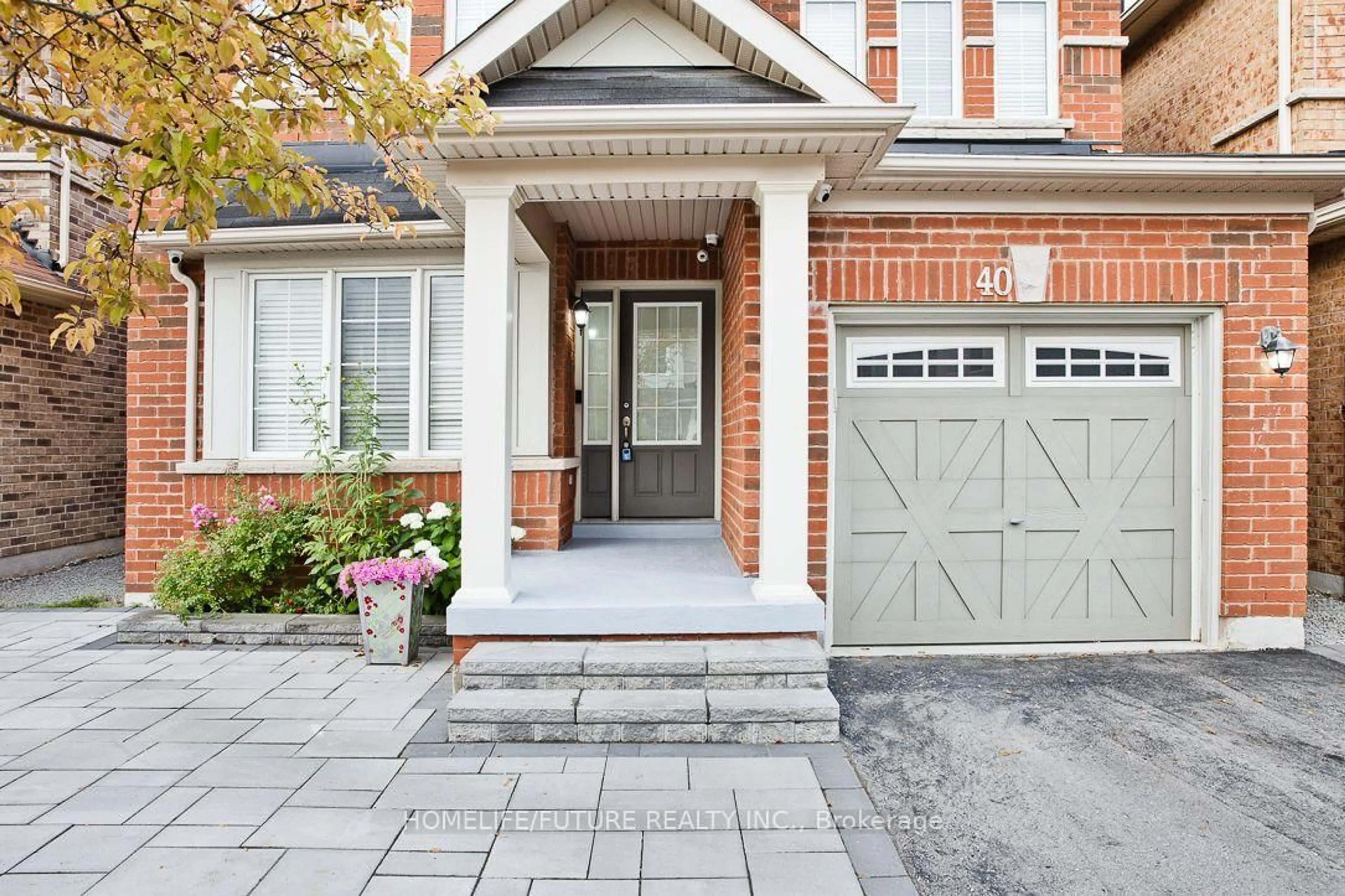 Home with brick exterior material, street for 40 Oswell Dr, Ajax Ontario L1Z 0L4