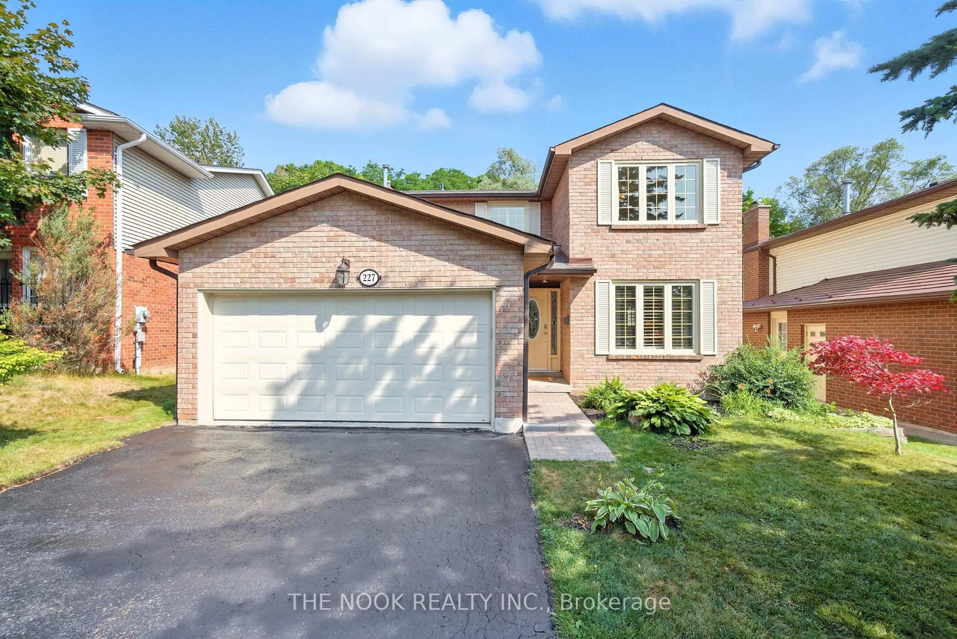 Home with brick exterior material, street for 227 Blue Heron Dr, Oshawa Ontario L1G 6X7