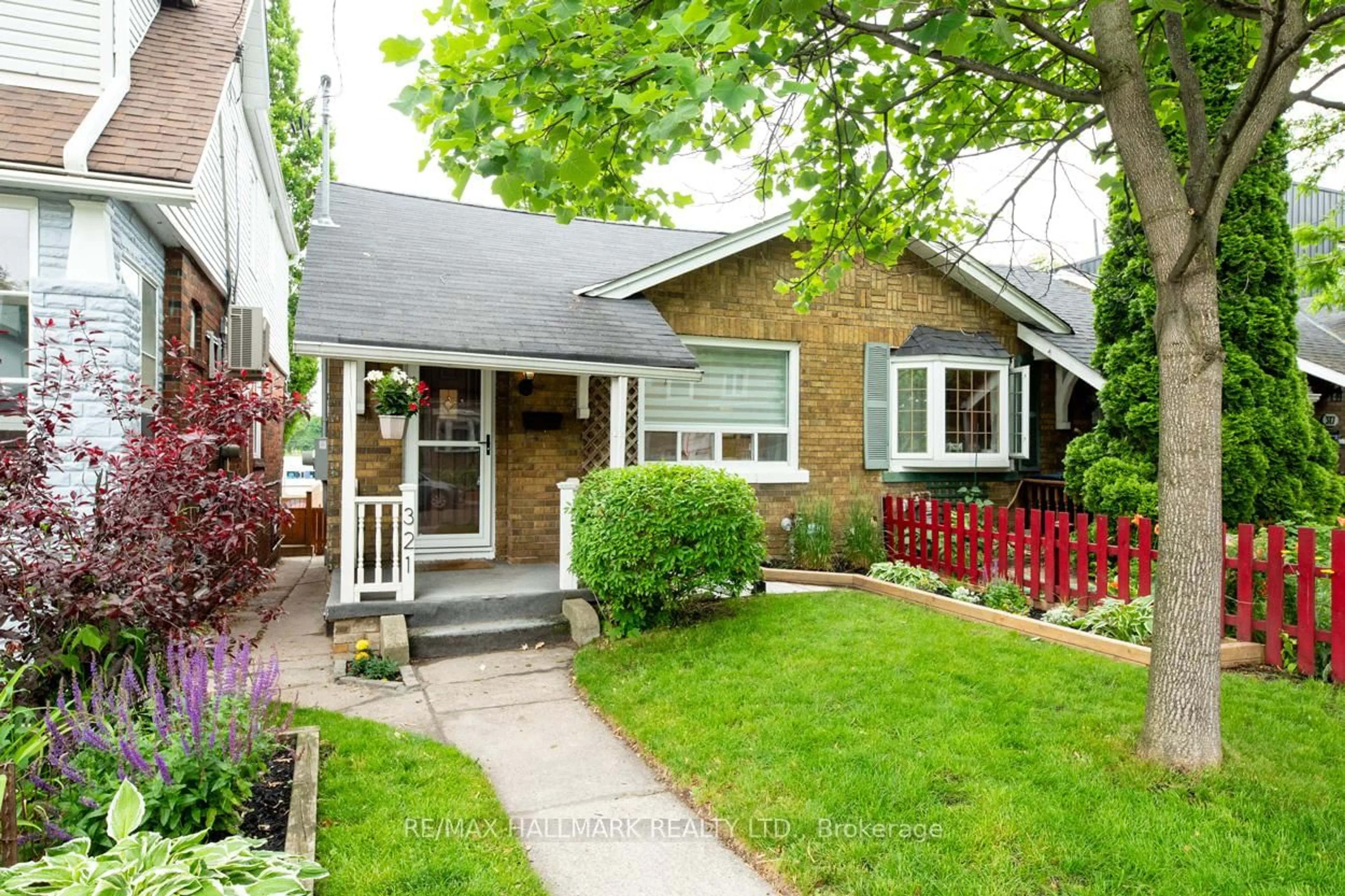 Home with brick exterior material, street for 321 Victoria Park Ave, Toronto Ontario M4E 3S7
