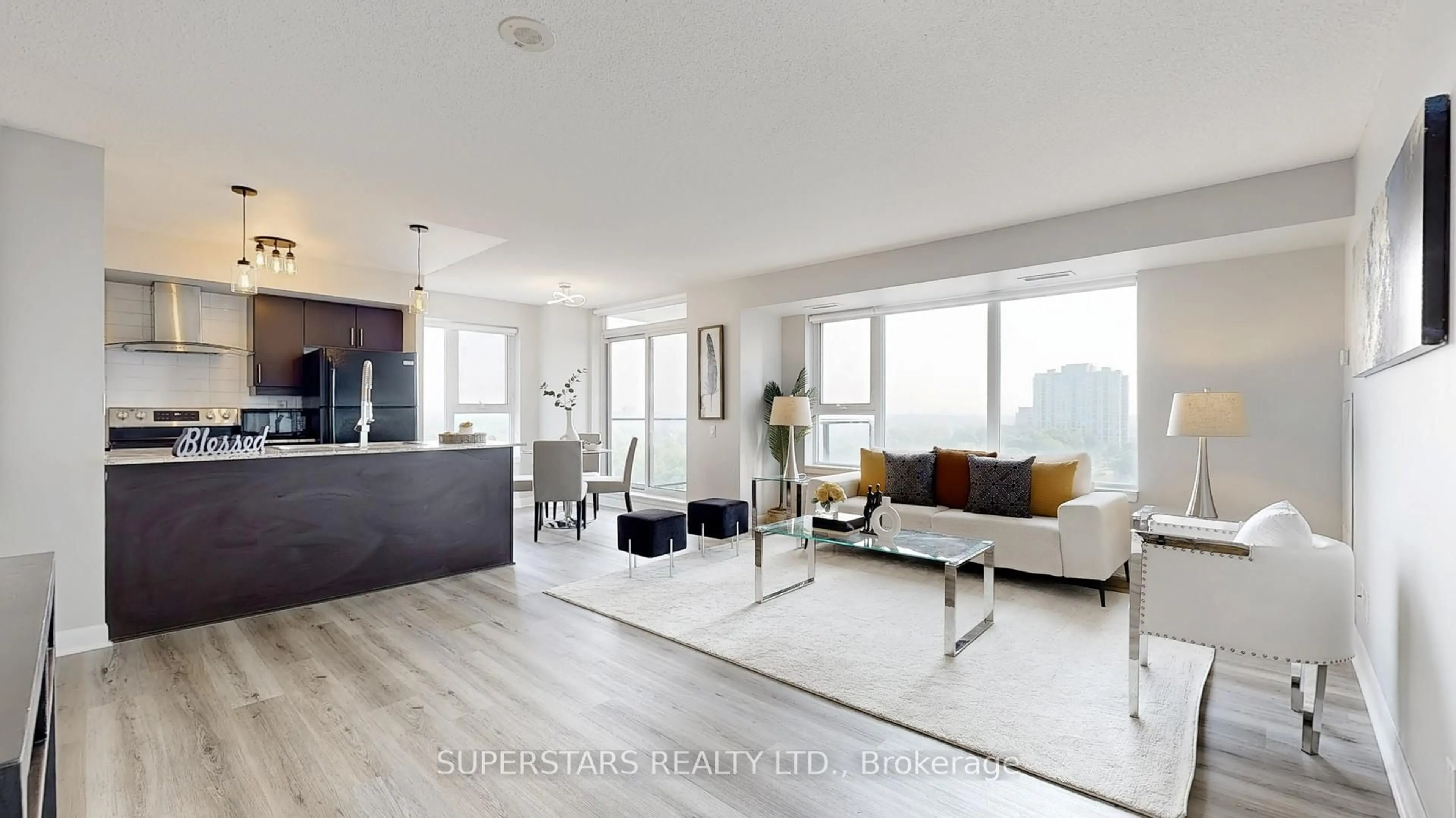 Living room with furniture, wood/laminate floor for 25 Town Centre Crt #1608, Toronto Ontario M1P 0B4