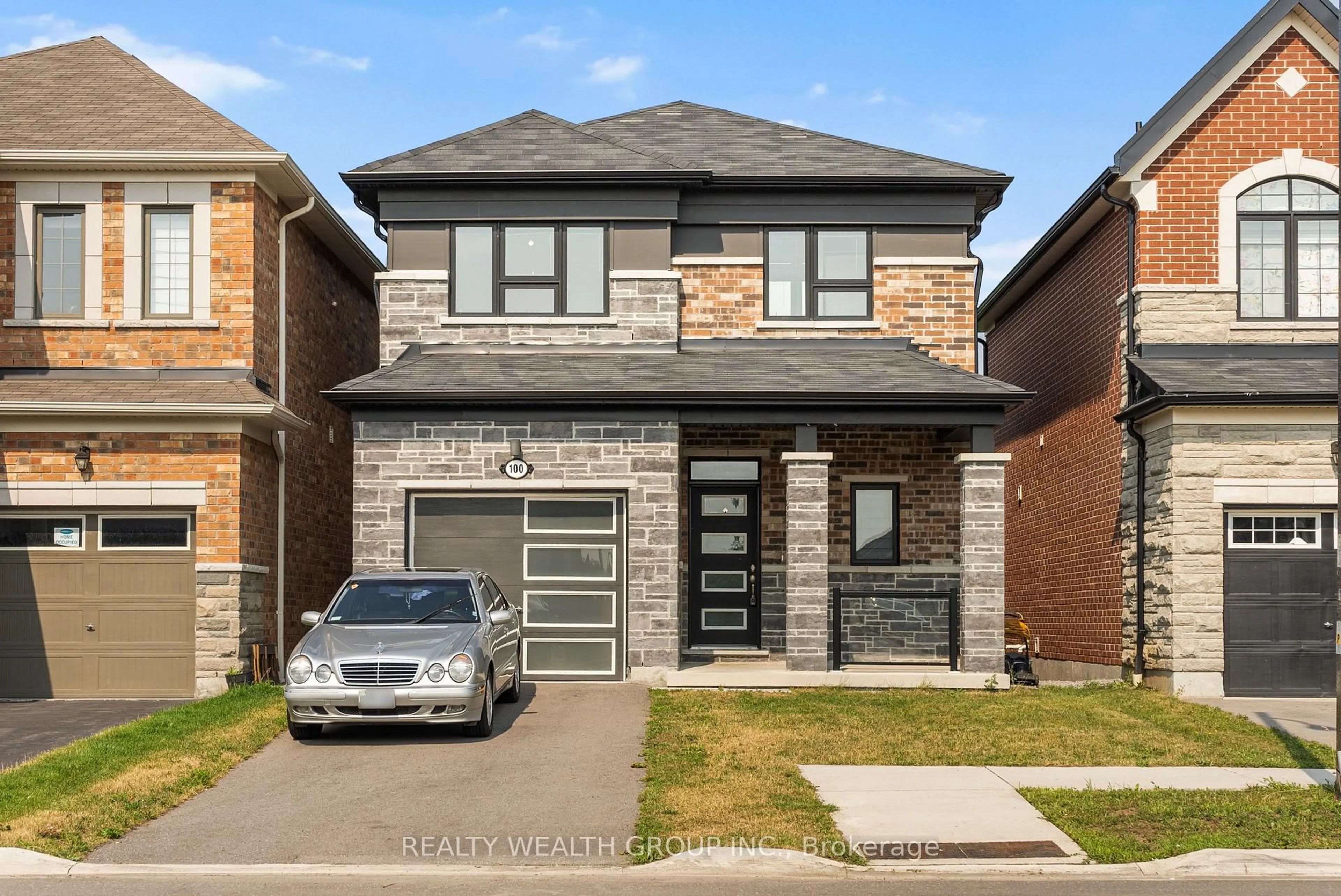 Home with brick exterior material, street for 100 BARKERVILLE Dr, Whitby Ontario L1P 0L8