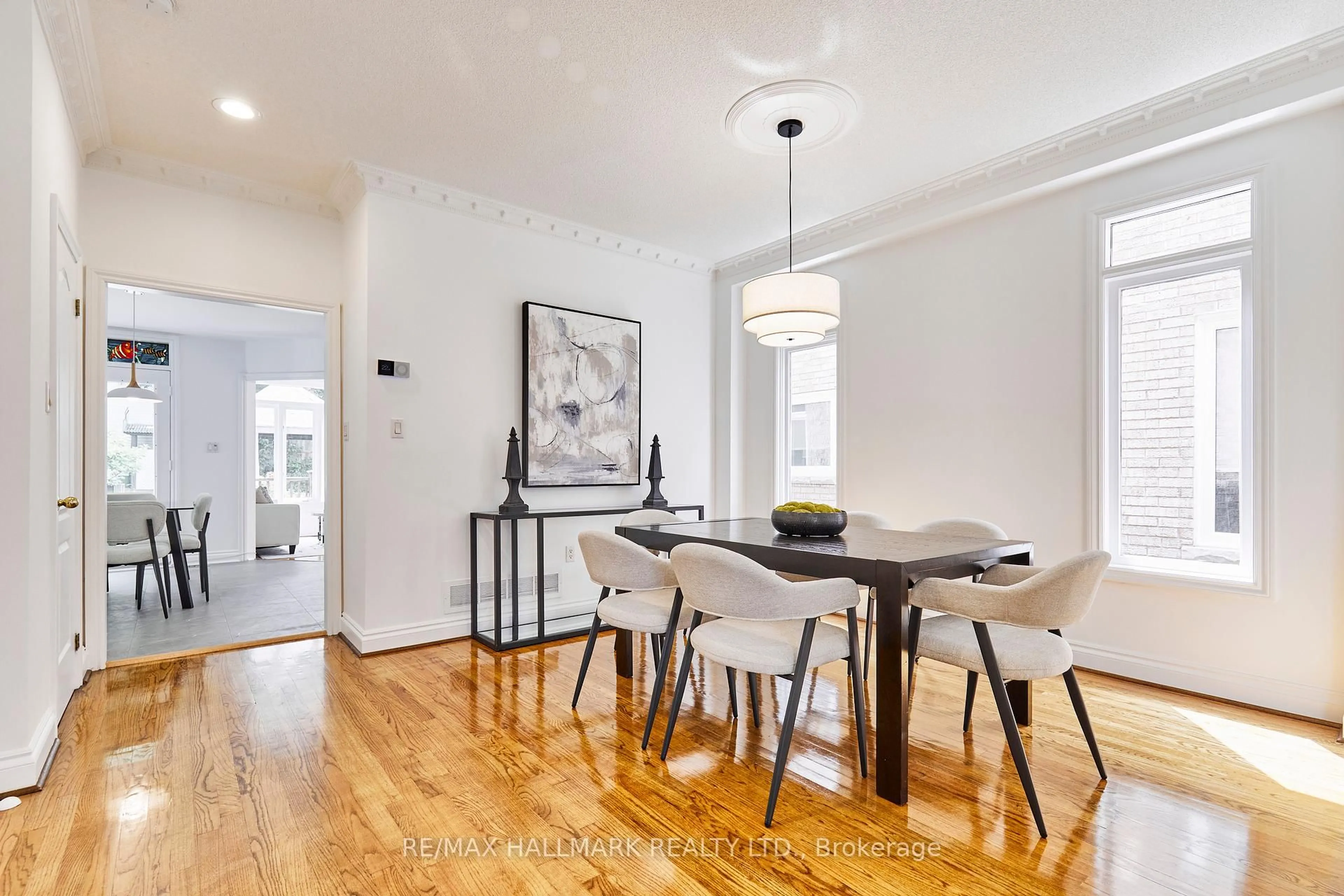Dining room, wood/laminate floor for 103A Maclean Ave, Toronto Ontario M4E 2Z8