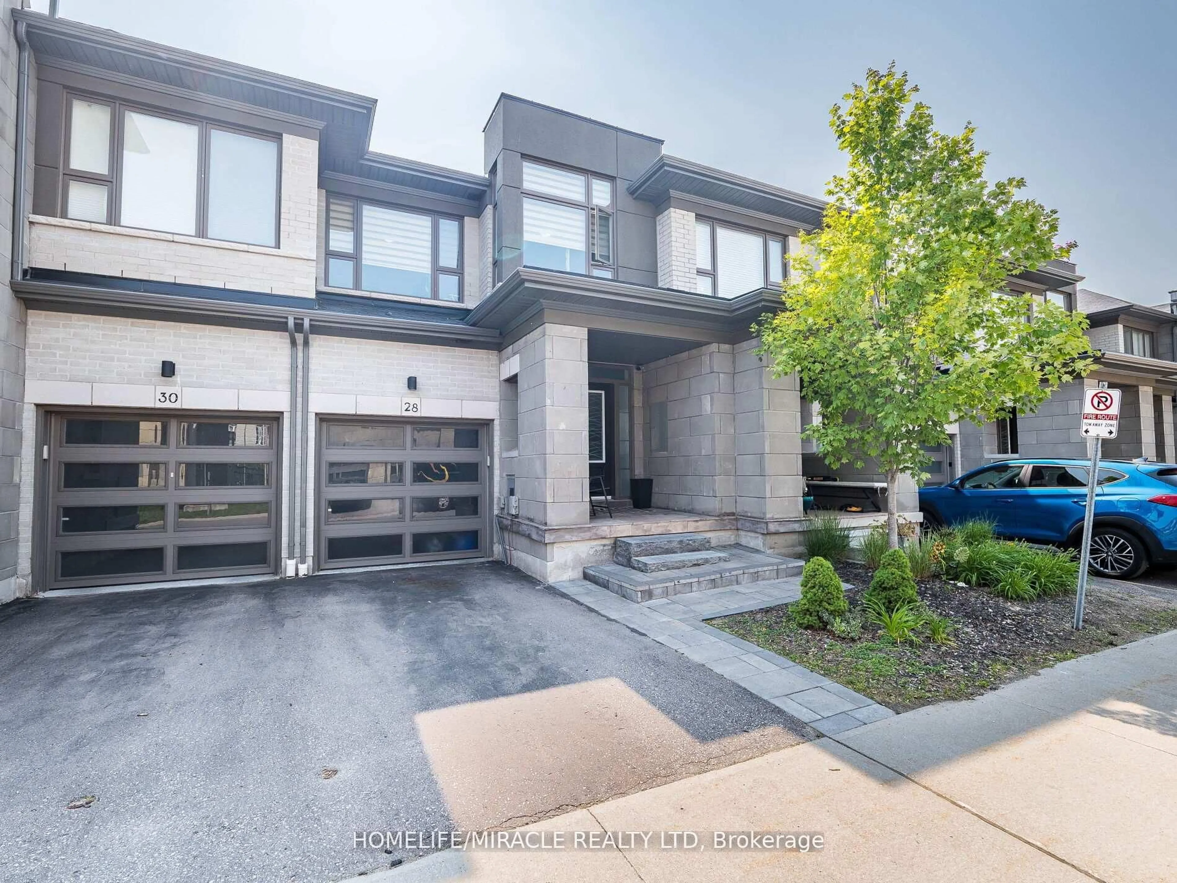 Home with brick exterior material, street for 28 Donald Fleming Way #147, Whitby Ontario L1R 0N8