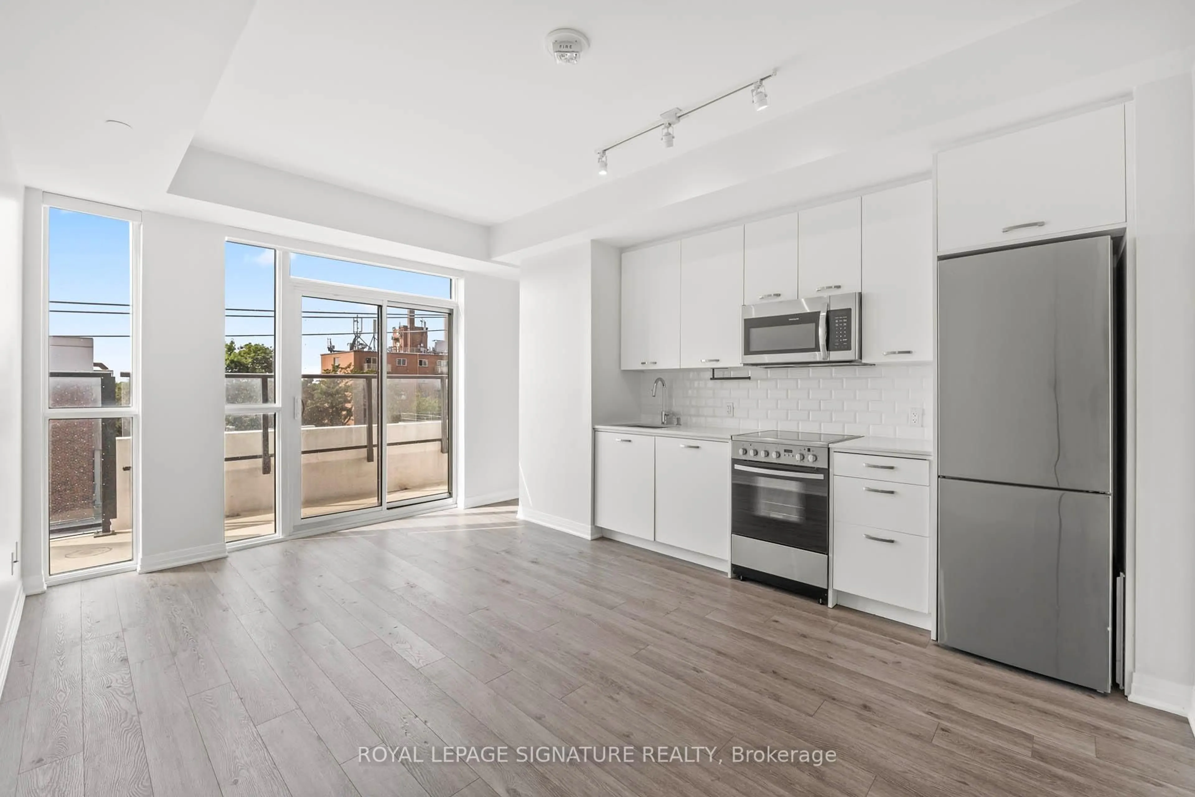 Open concept kitchen, unknown for 1630 Queen St #405, Toronto Ontario M4L 1G3