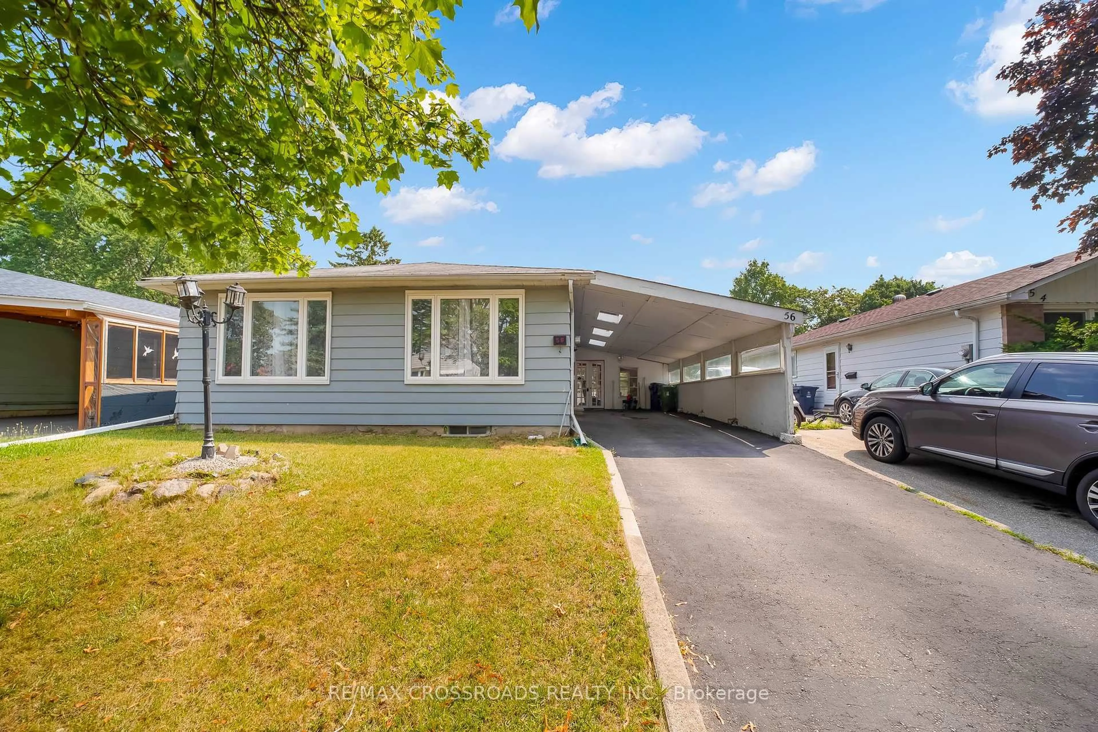 Home with vinyl exterior material, street for 56 Hutcherson Sq, Toronto Ontario M1B 1C6