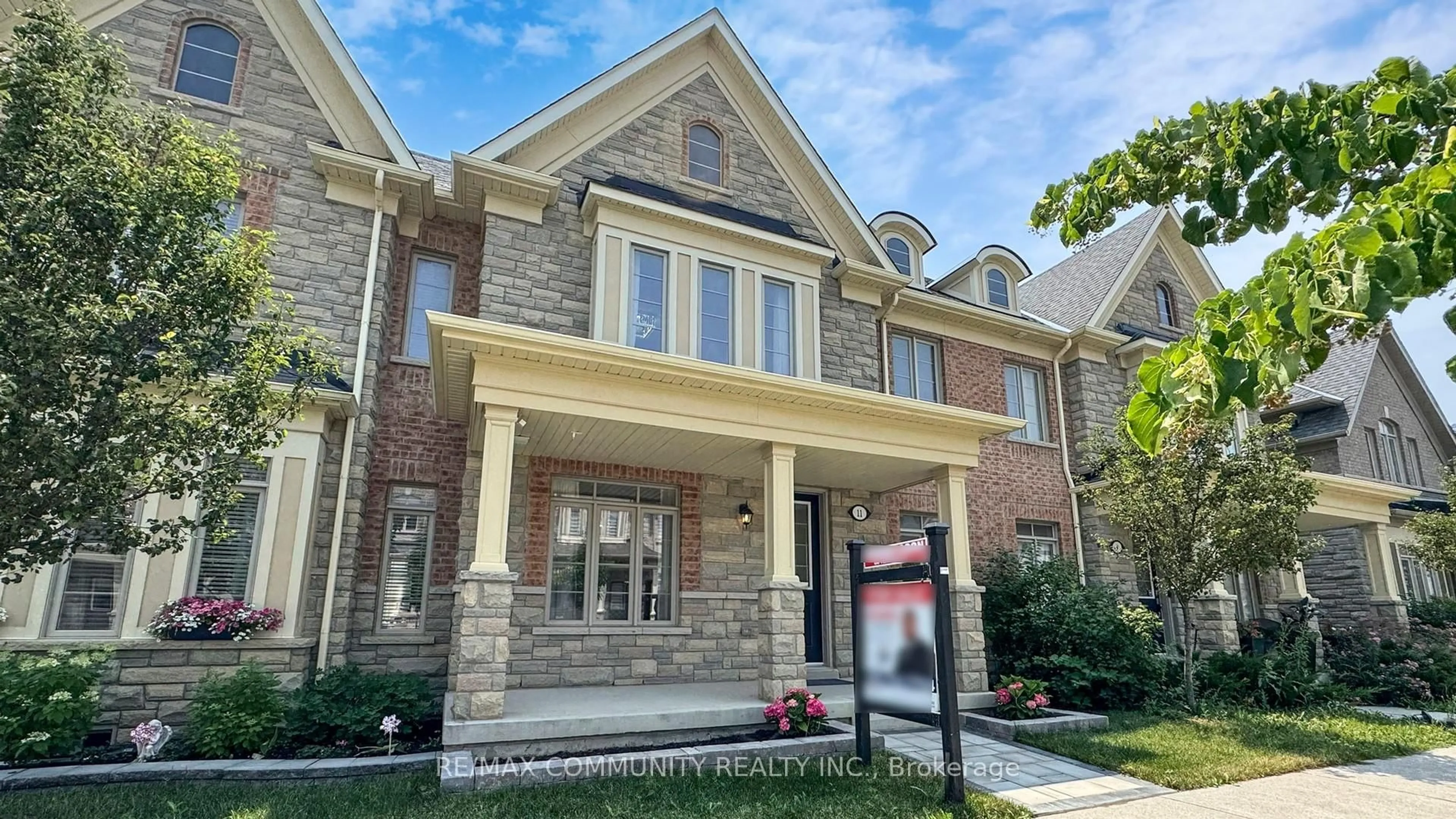 Home with brick exterior material, street for 11 Clutterbuck Lane, Ajax Ontario L1T 0N6