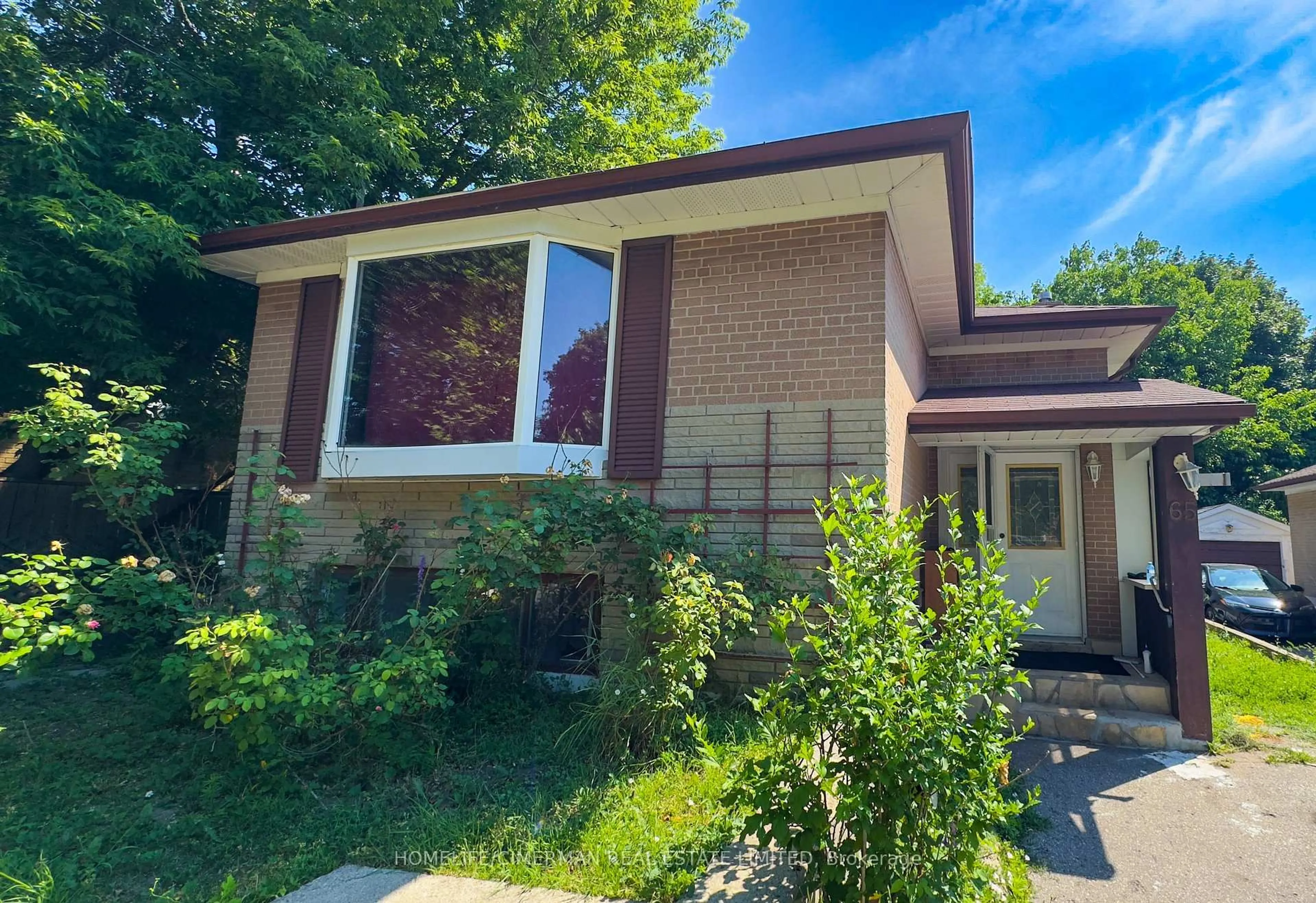 Home with brick exterior material, street for 65 Sharbot Ave, Toronto Ontario M1H 1Z2