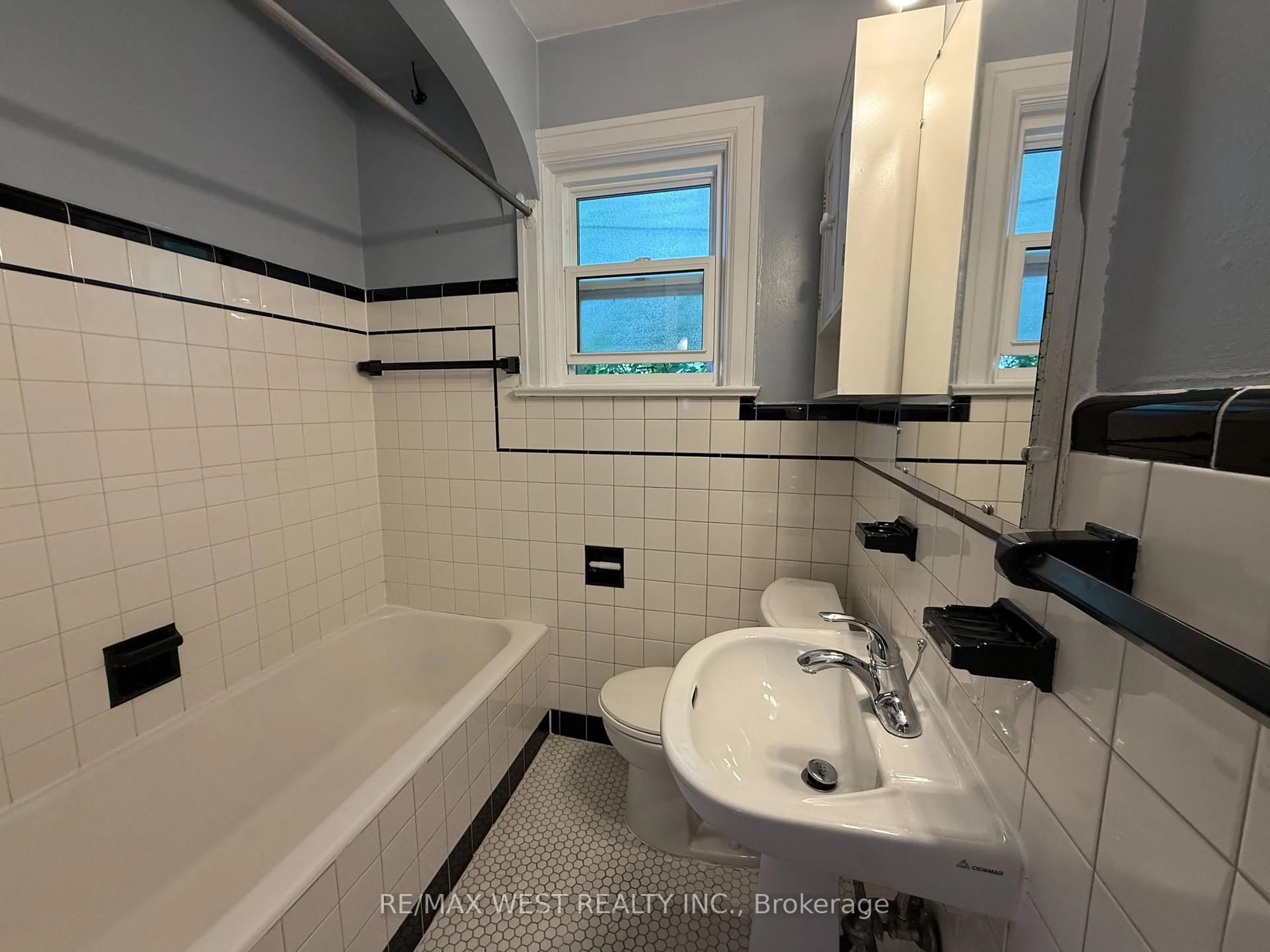 Standard bathroom, ceramic/tile floor for 27 Frater Ave, Toronto Ontario M4C 2H3