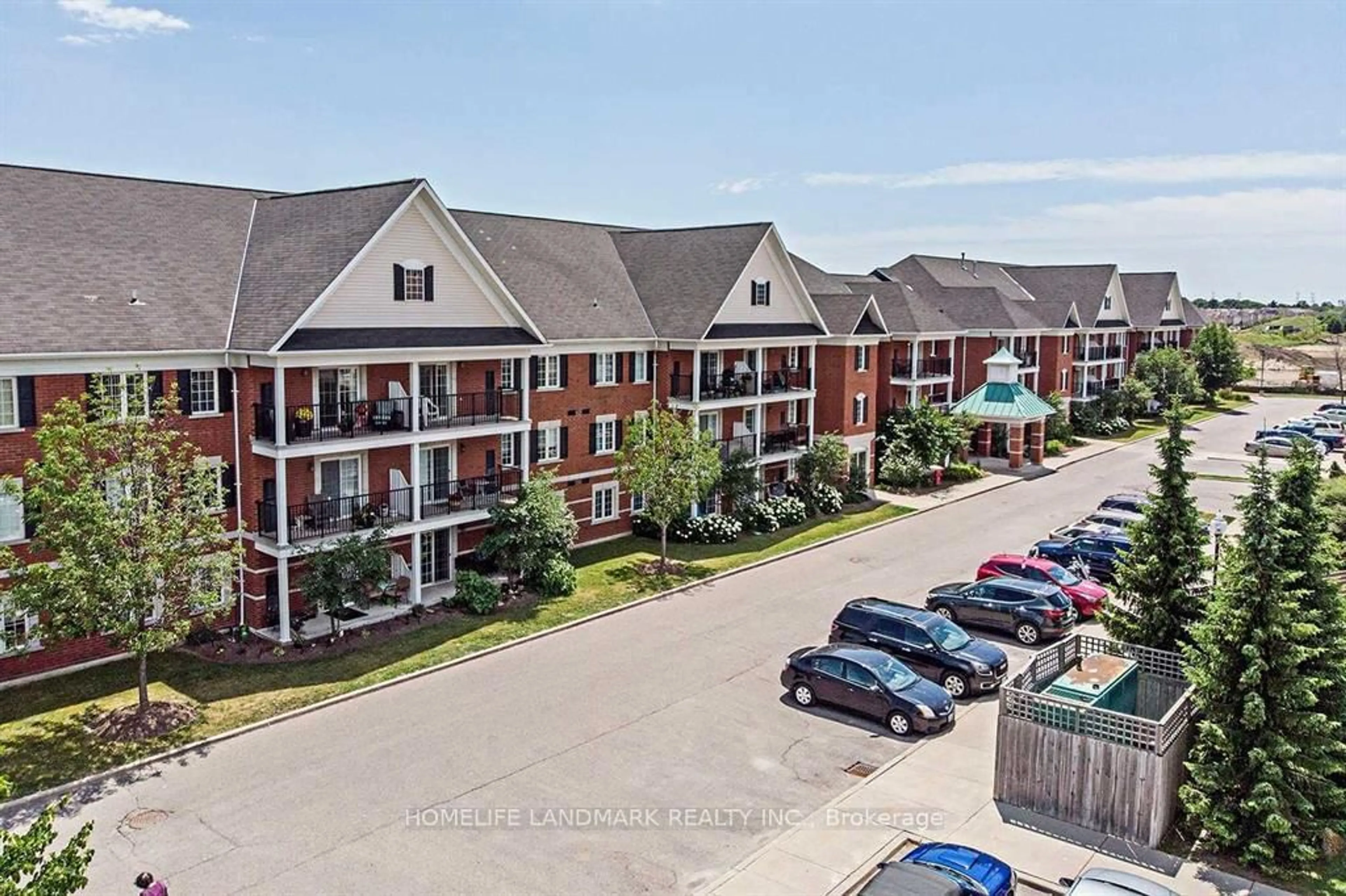 A pic from outside/outdoor area/front of a property/back of a property/a pic from drone, mountain view for 61 Clarington Blvd #213, Clarington Ontario L1C 3K7