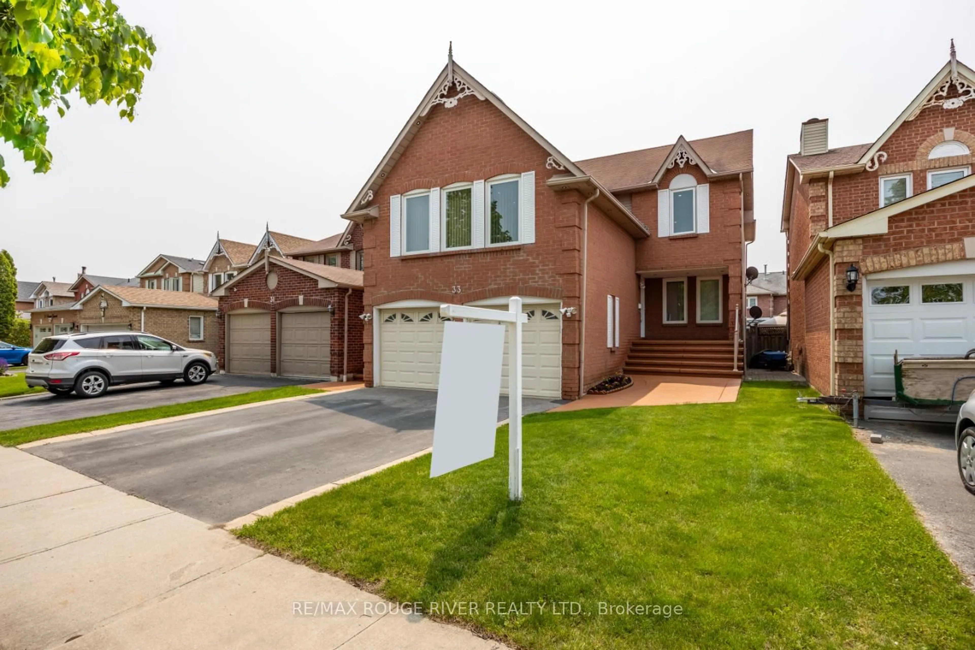 Home with brick exterior material, street for 33 Hearne Cres, Ajax Ontario L1T 3P5