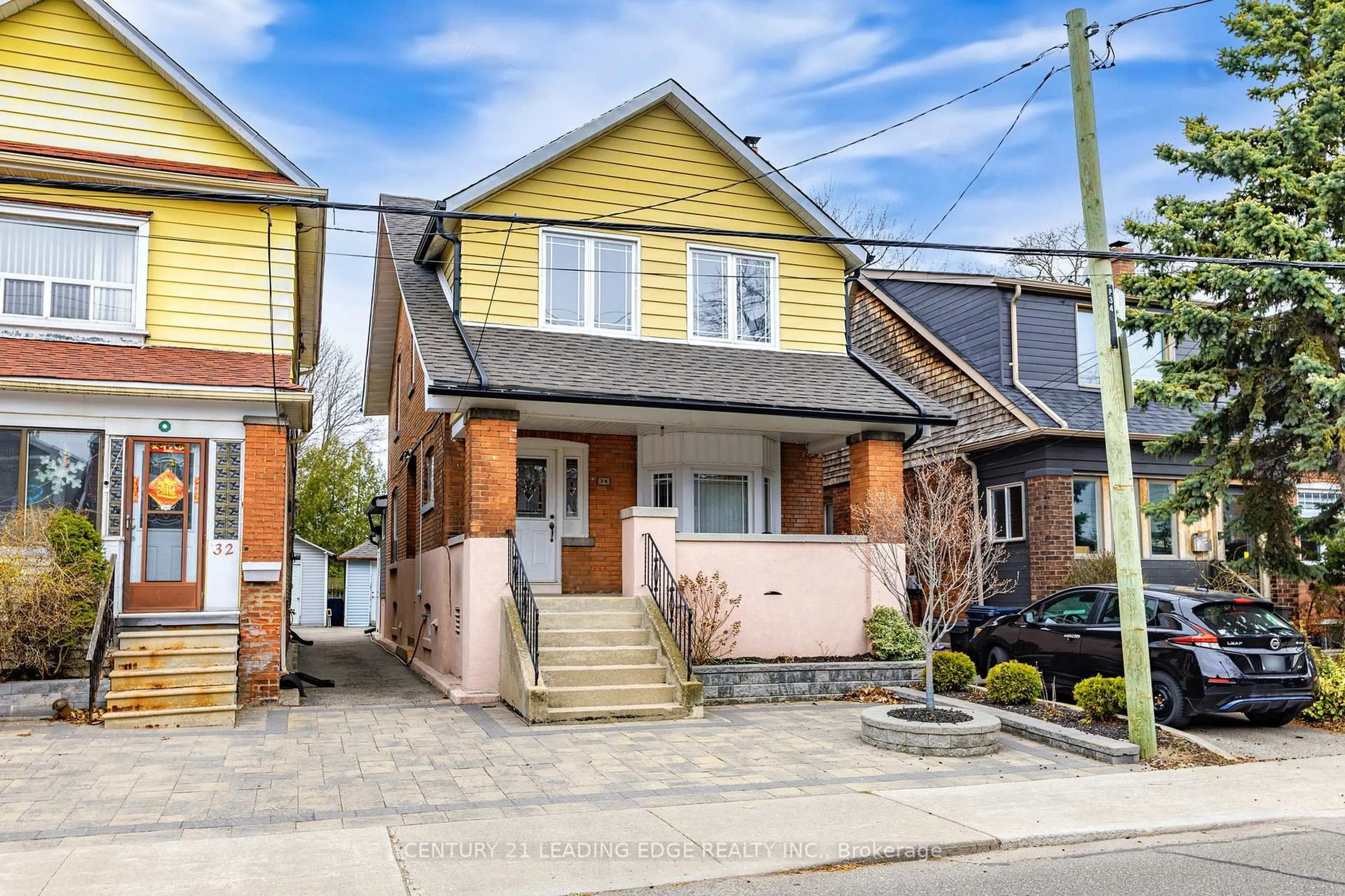 Home with brick exterior material, street for 34 CHISHOLM Ave, Toronto Ontario M4C 4V2