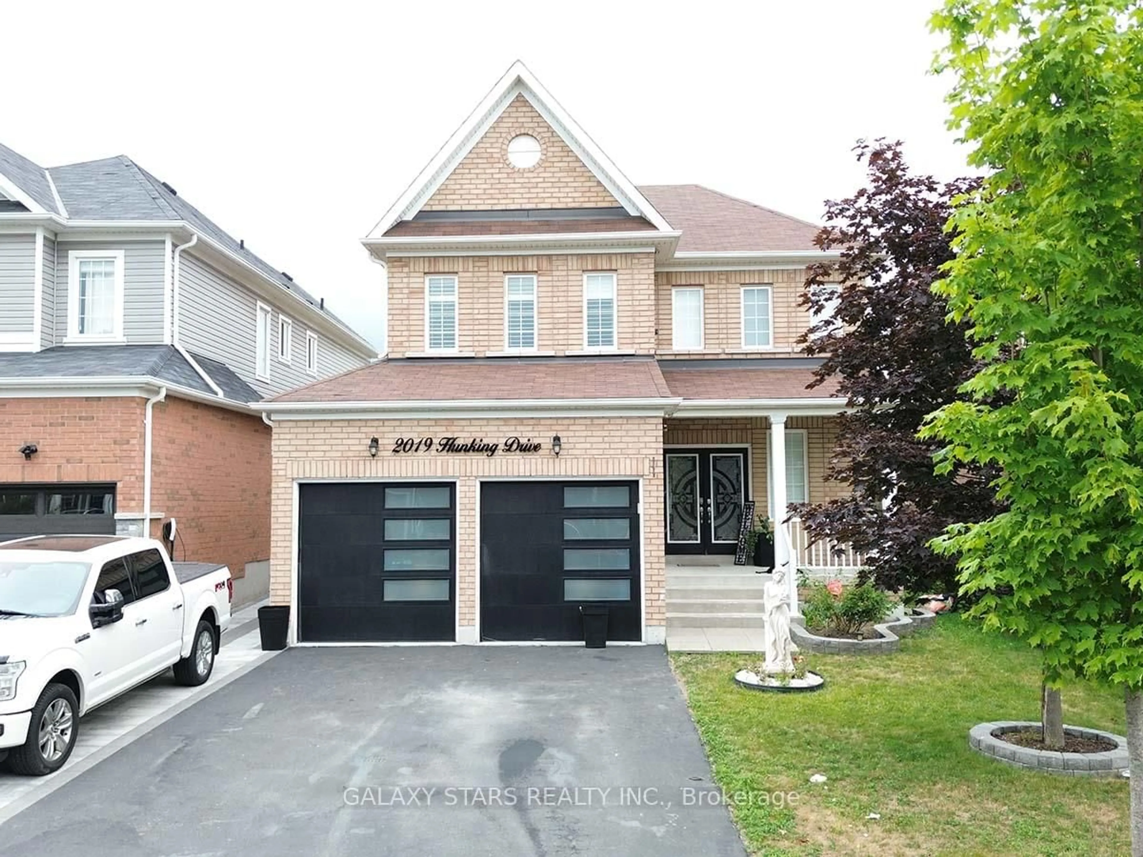 Home with brick exterior material, street for 2019 Hunking Dr, Oshawa Ontario L1K 0V3