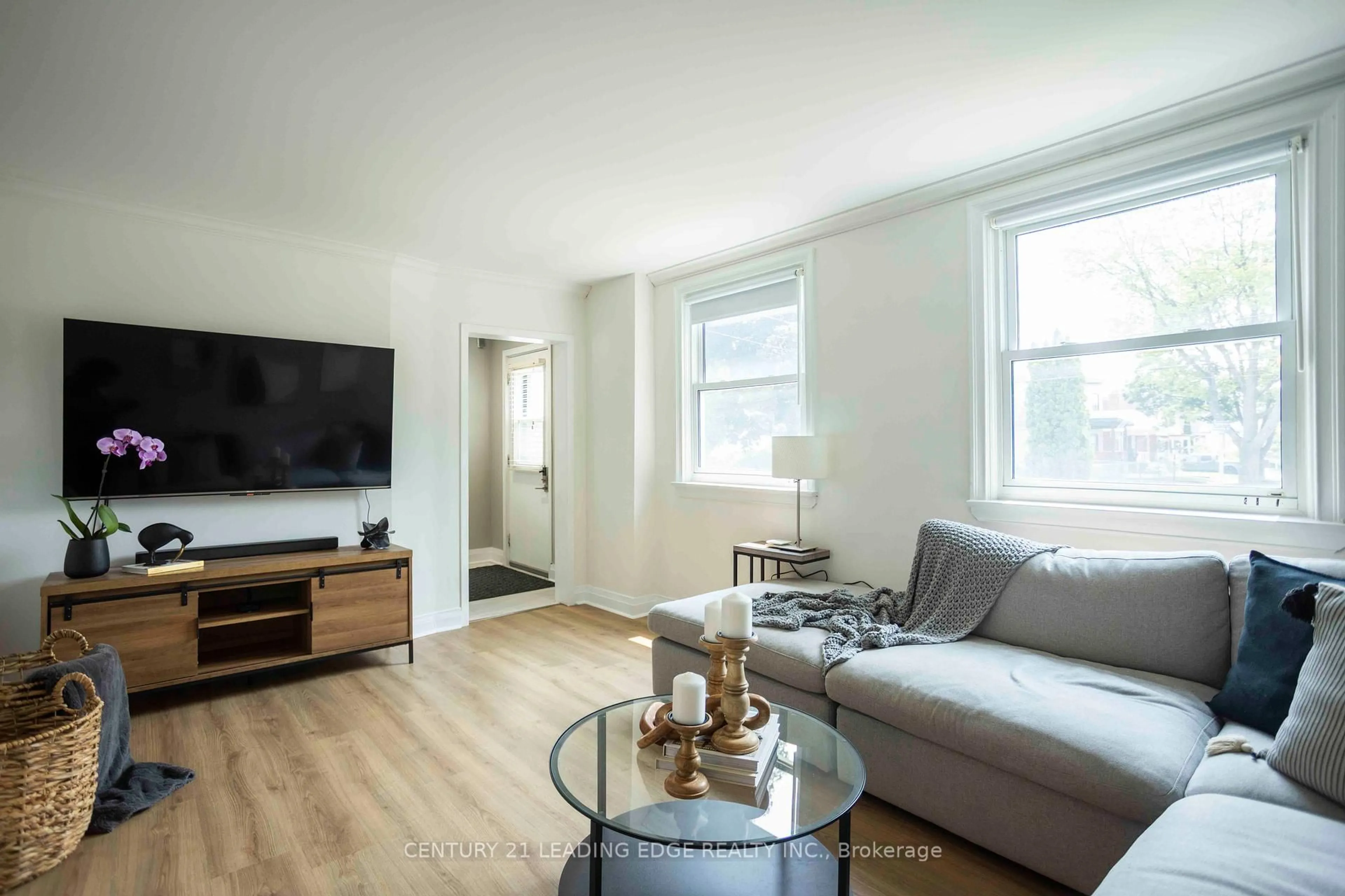 Living room with furniture, wood/laminate floor for 394 Beverly St, Oshawa Ontario L1G 1P6