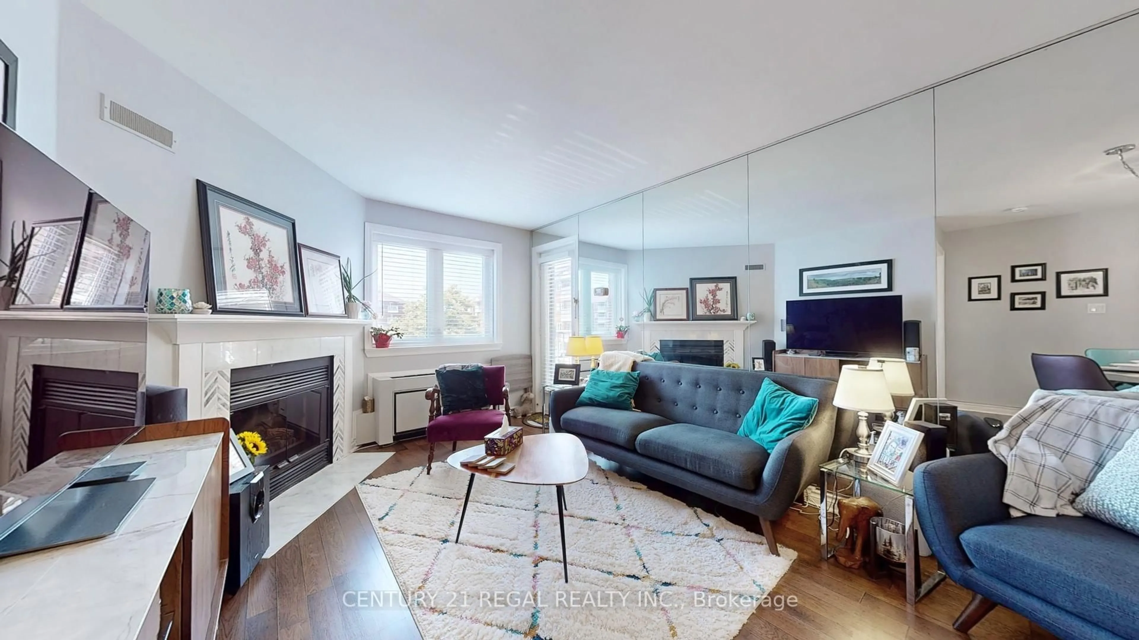 Living room with furniture, wood/laminate floor for 195 Lake Driveway Dr #211, Ajax Ontario L1S 7H7
