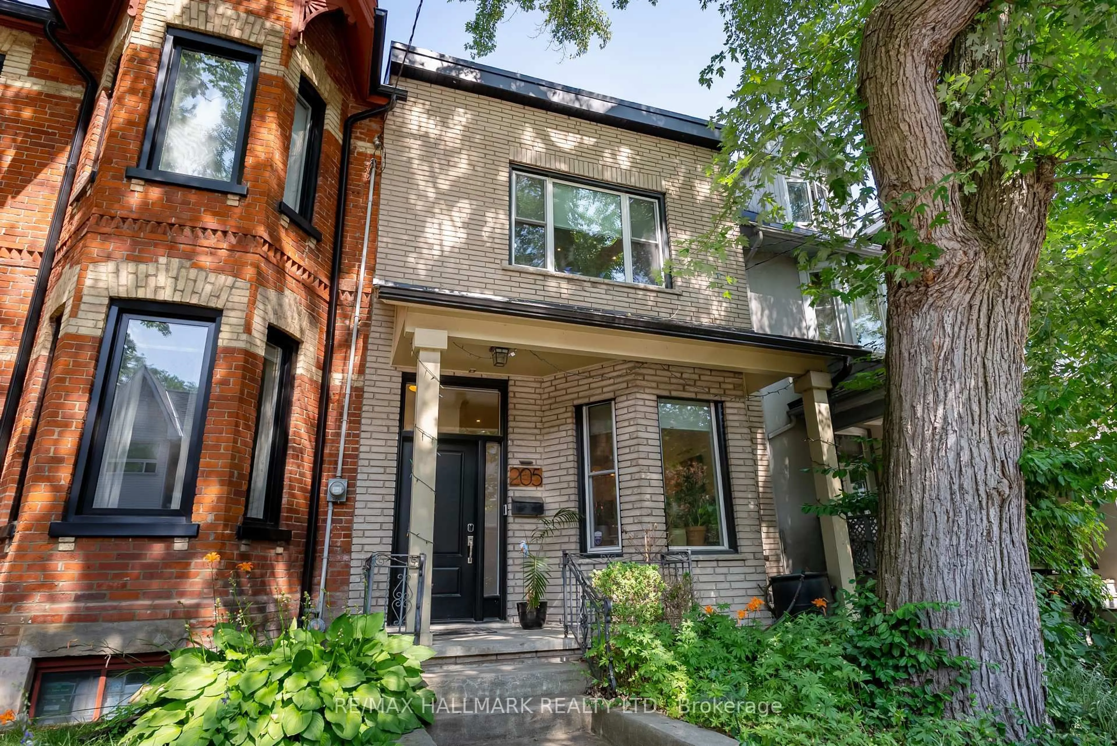 Home with brick exterior material, street for 205 Boulton Ave, Toronto Ontario M4M 2J8