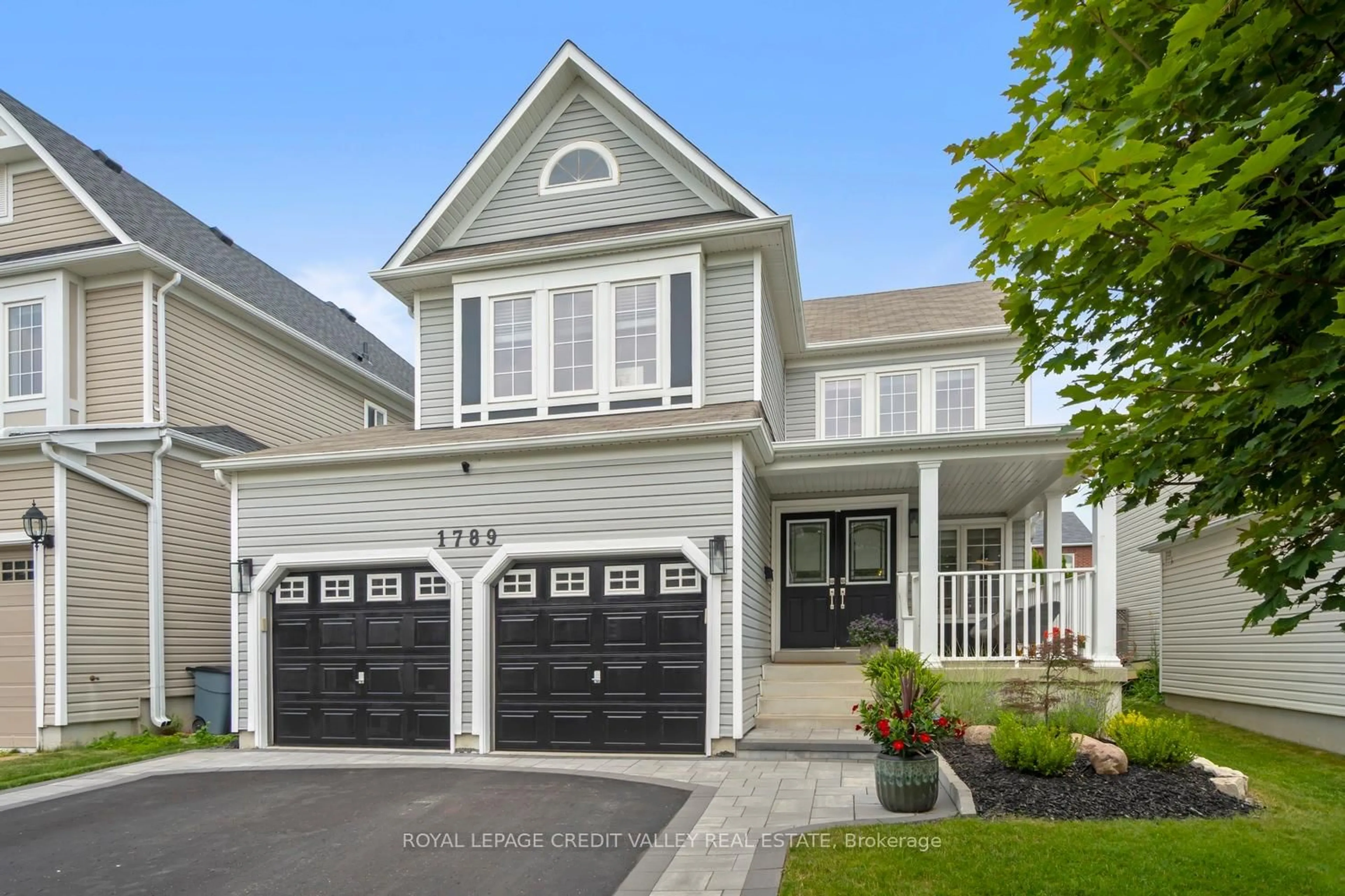 Home with vinyl exterior material, street for 1789 Badgley Dr, Oshawa Ontario L1K 0H6