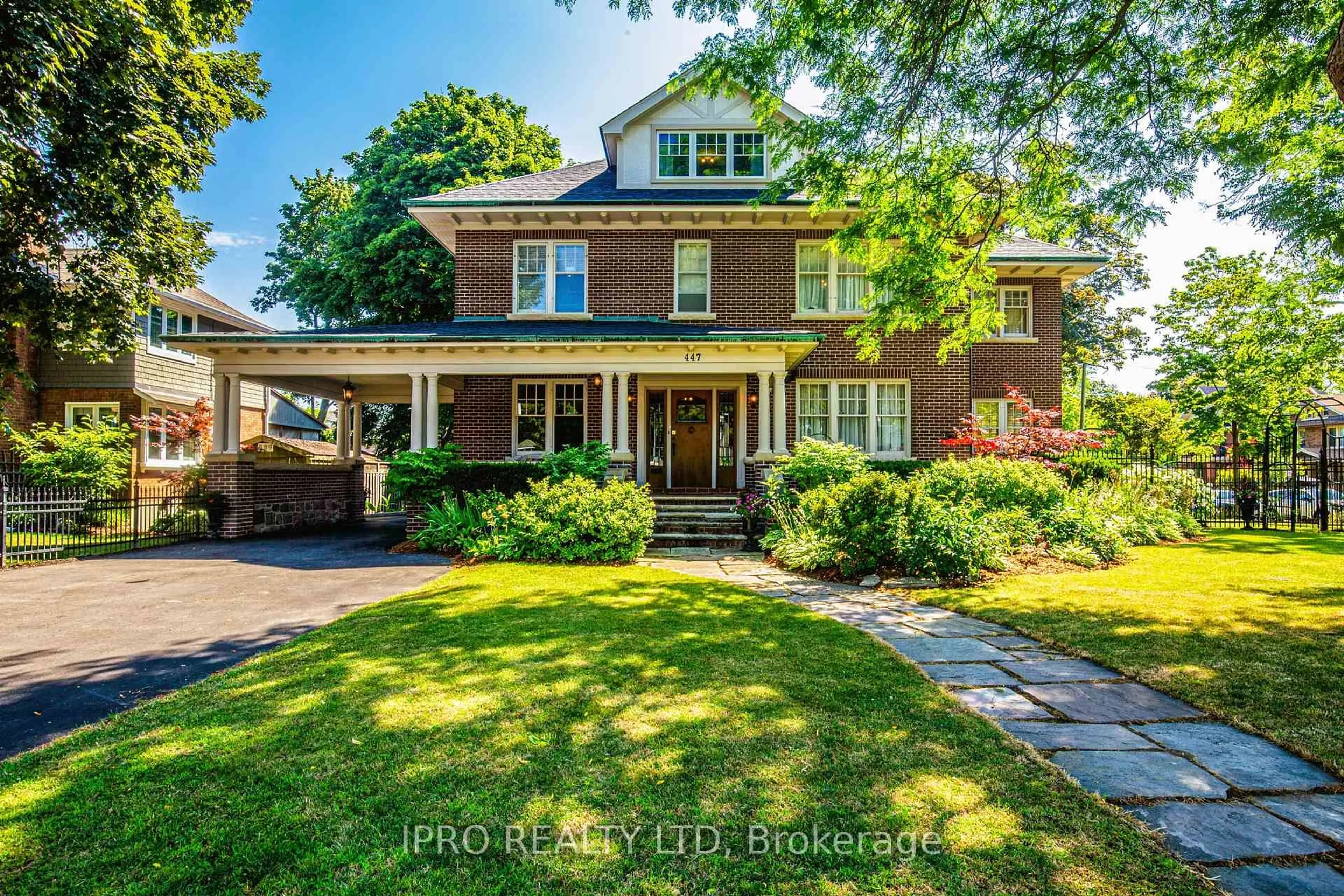 Home with brick exterior material, street for 447 Simcoe St, Oshawa Ontario L1G 4T8