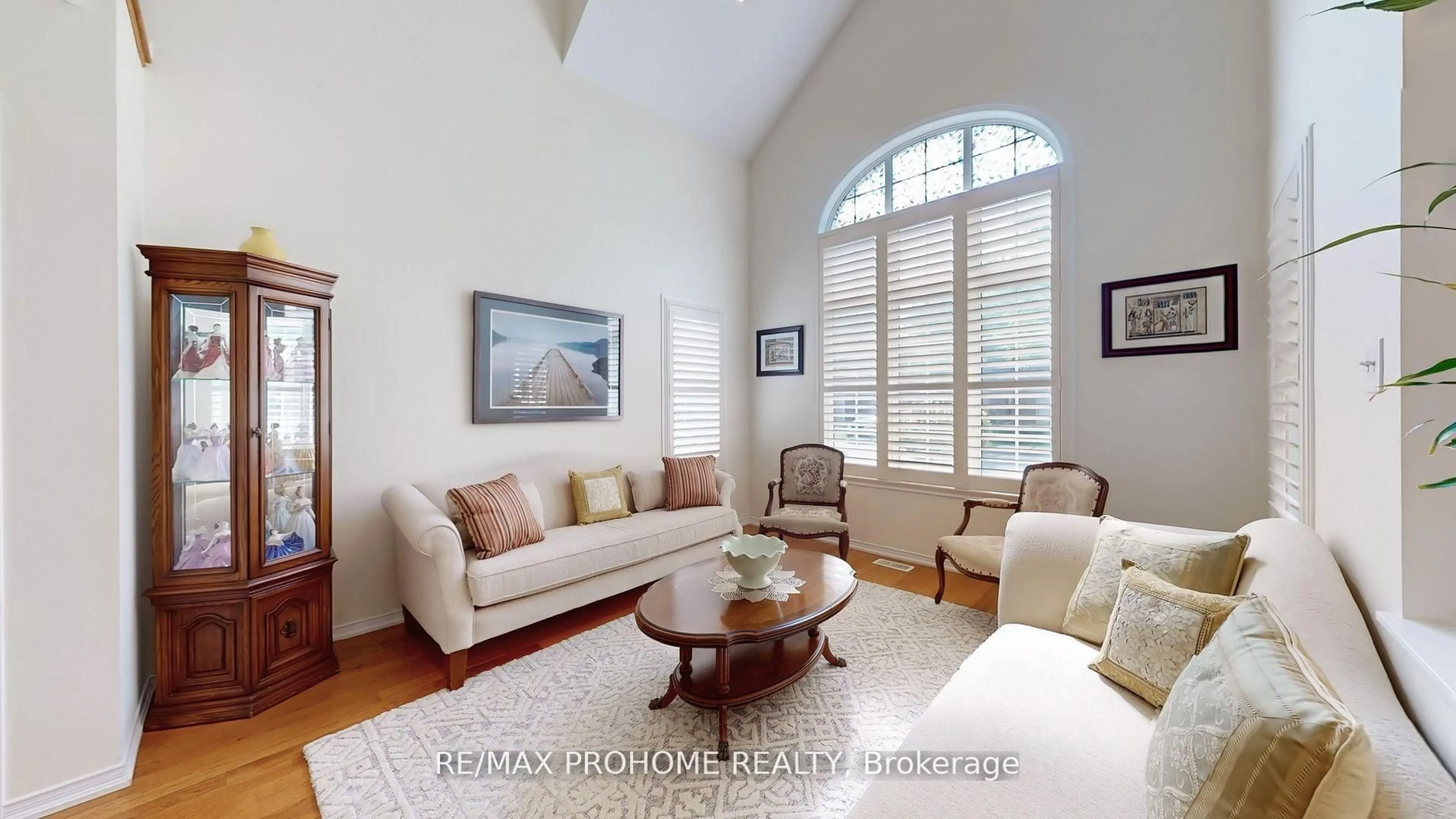 Living room with furniture, wood/laminate floor for 64 Grainger Cres, Ajax Ontario L1T 4Y6