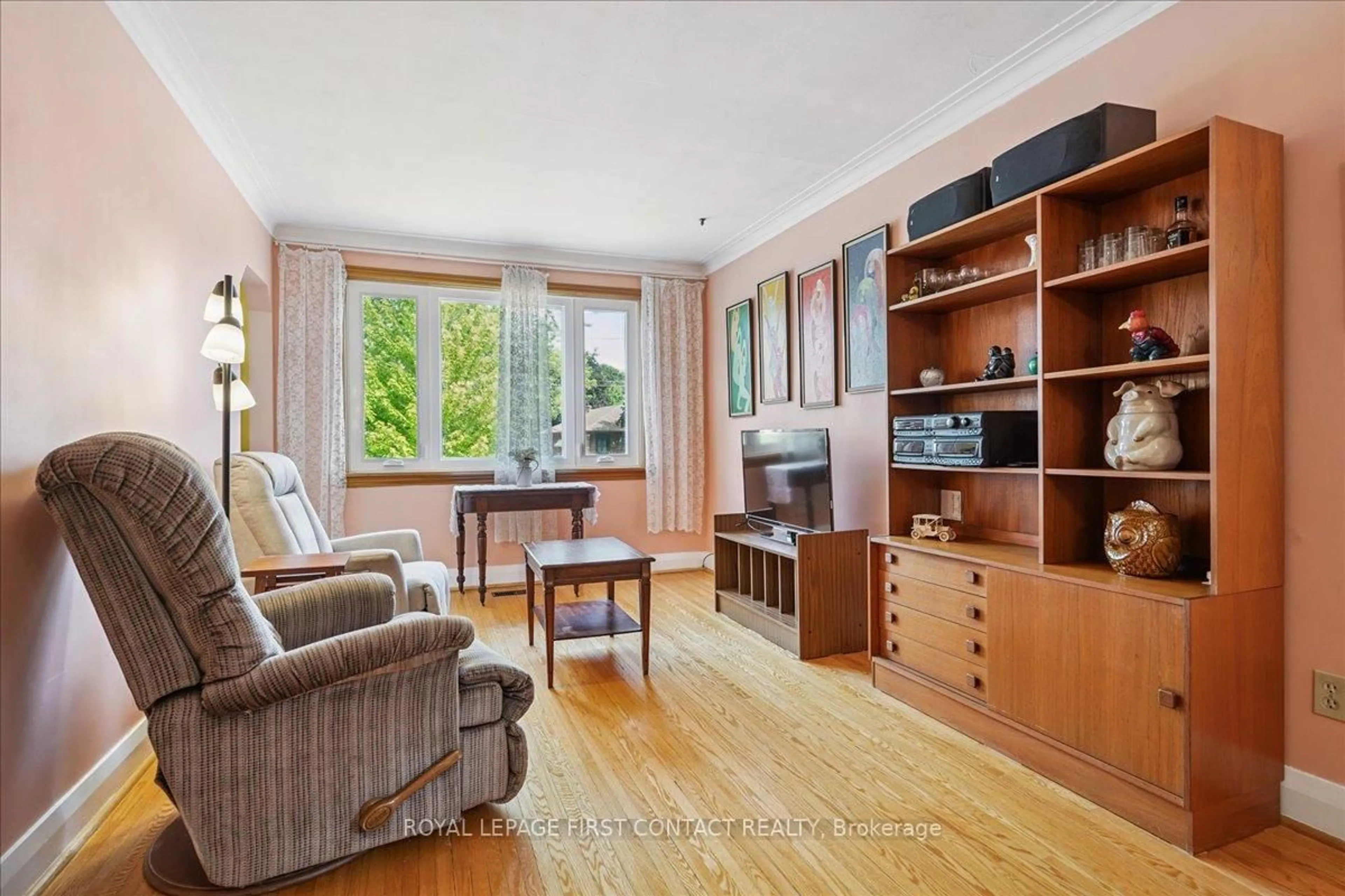 Living room with furniture, wood/laminate floor for 5 Radnor Ave, Toronto Ontario M1P 1G3