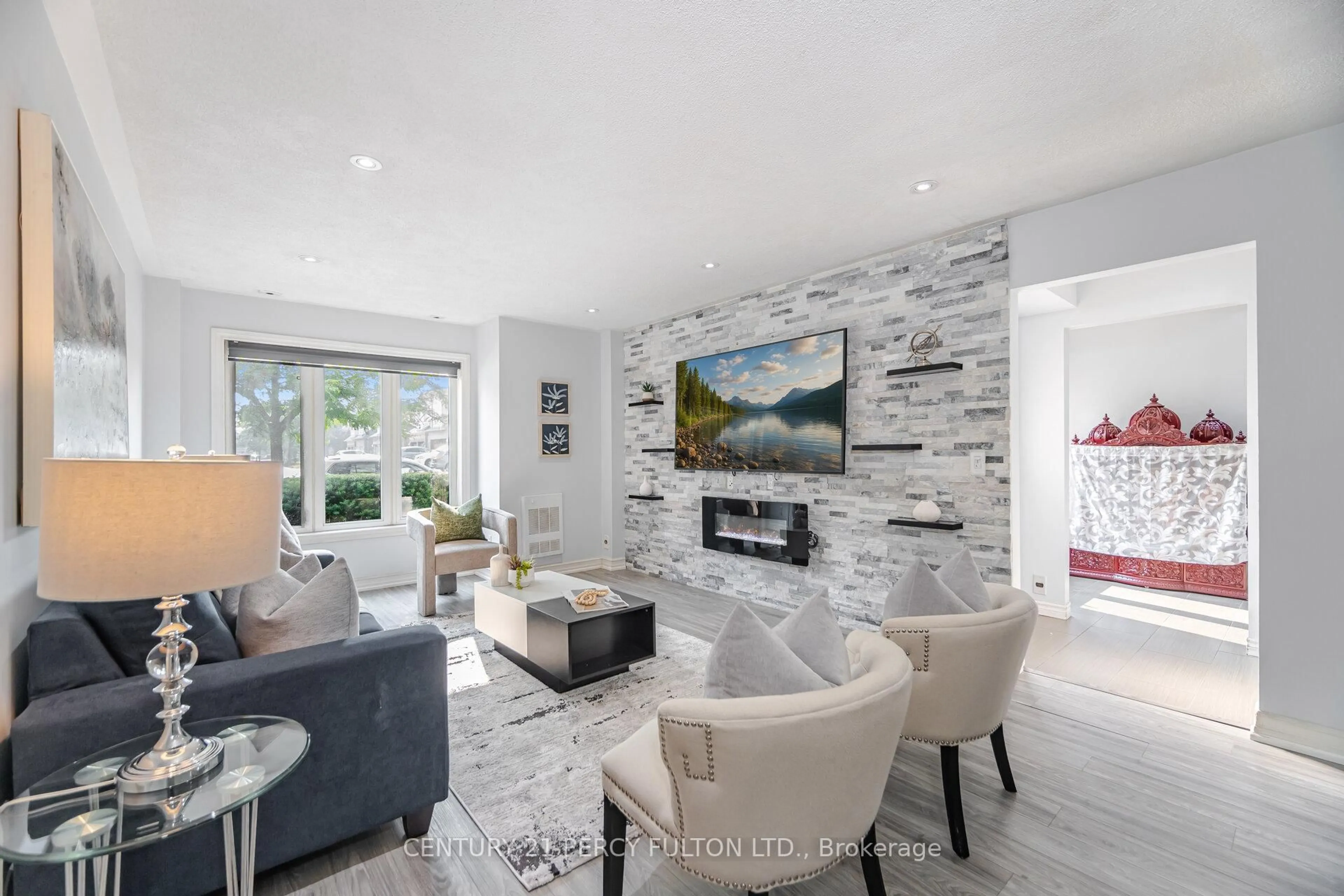 Living room with furniture, ceramic/tile floor for 29 Mondeo Dr, Toronto Ontario M1P 5B6