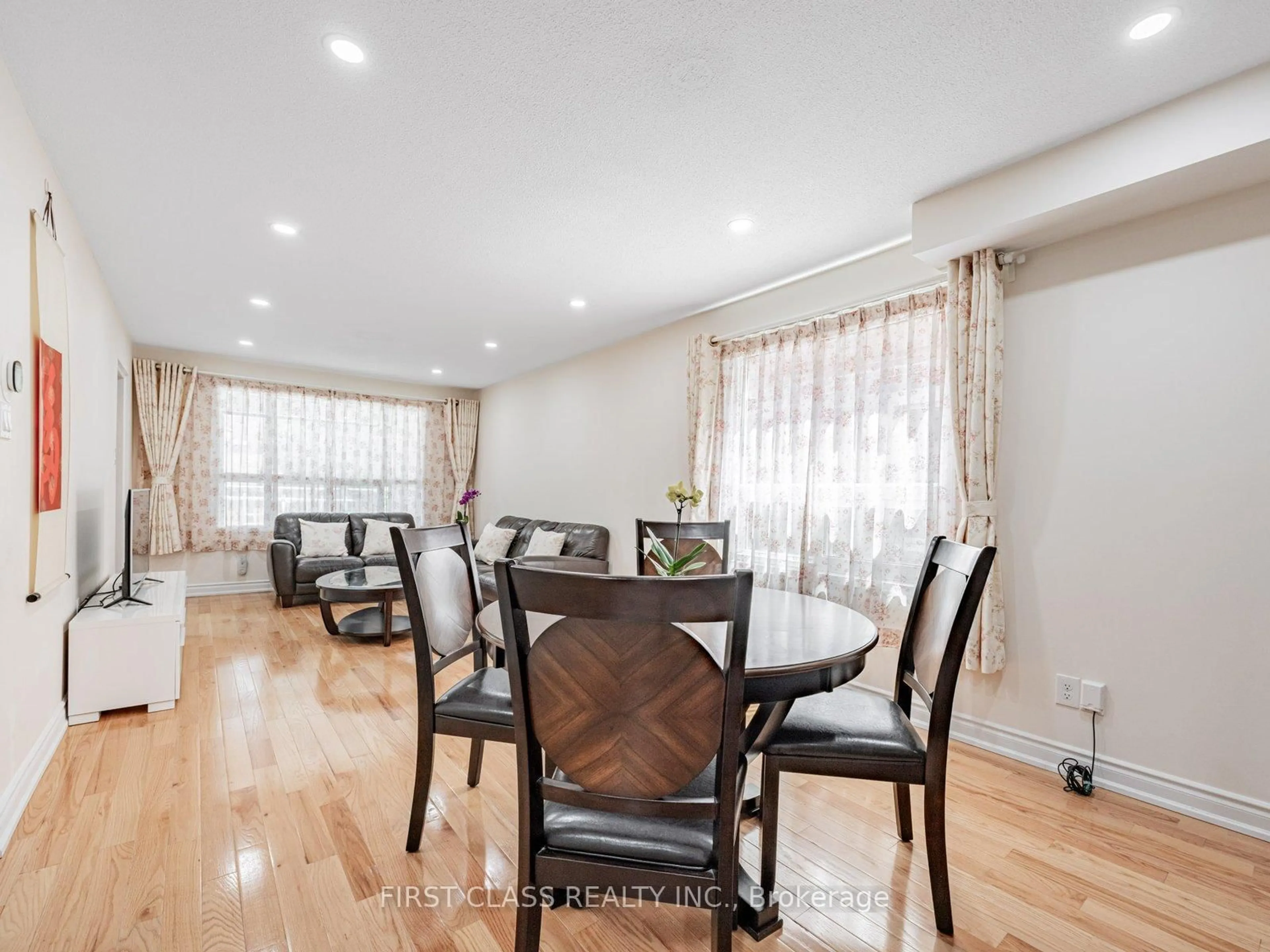 Dining room, wood/laminate floor for 4 Heaslip Terr, Toronto Ontario M1T 1W9