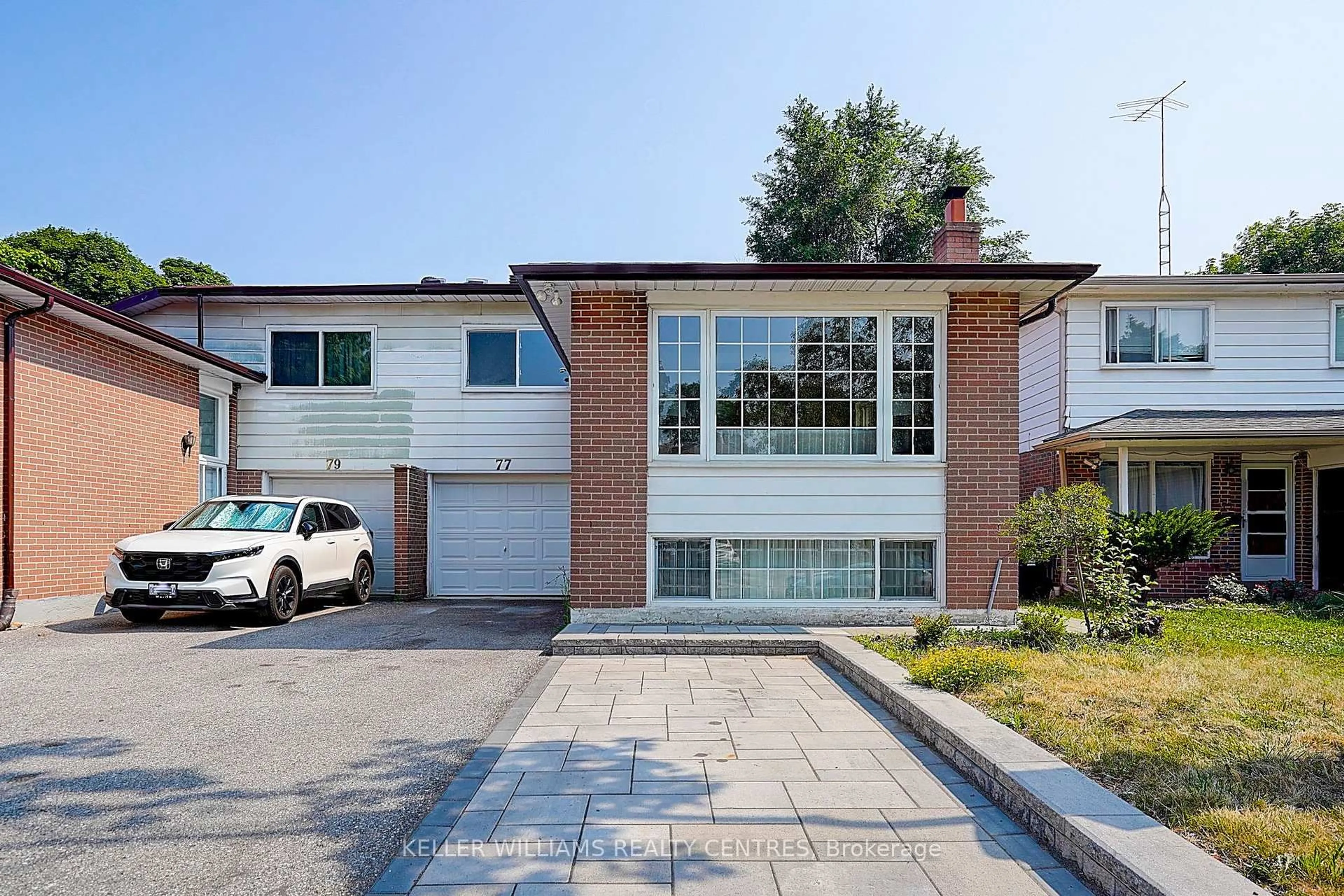 Home with brick exterior material, street for 77 Glenstroke Dr, Toronto Ontario M1S 3A1