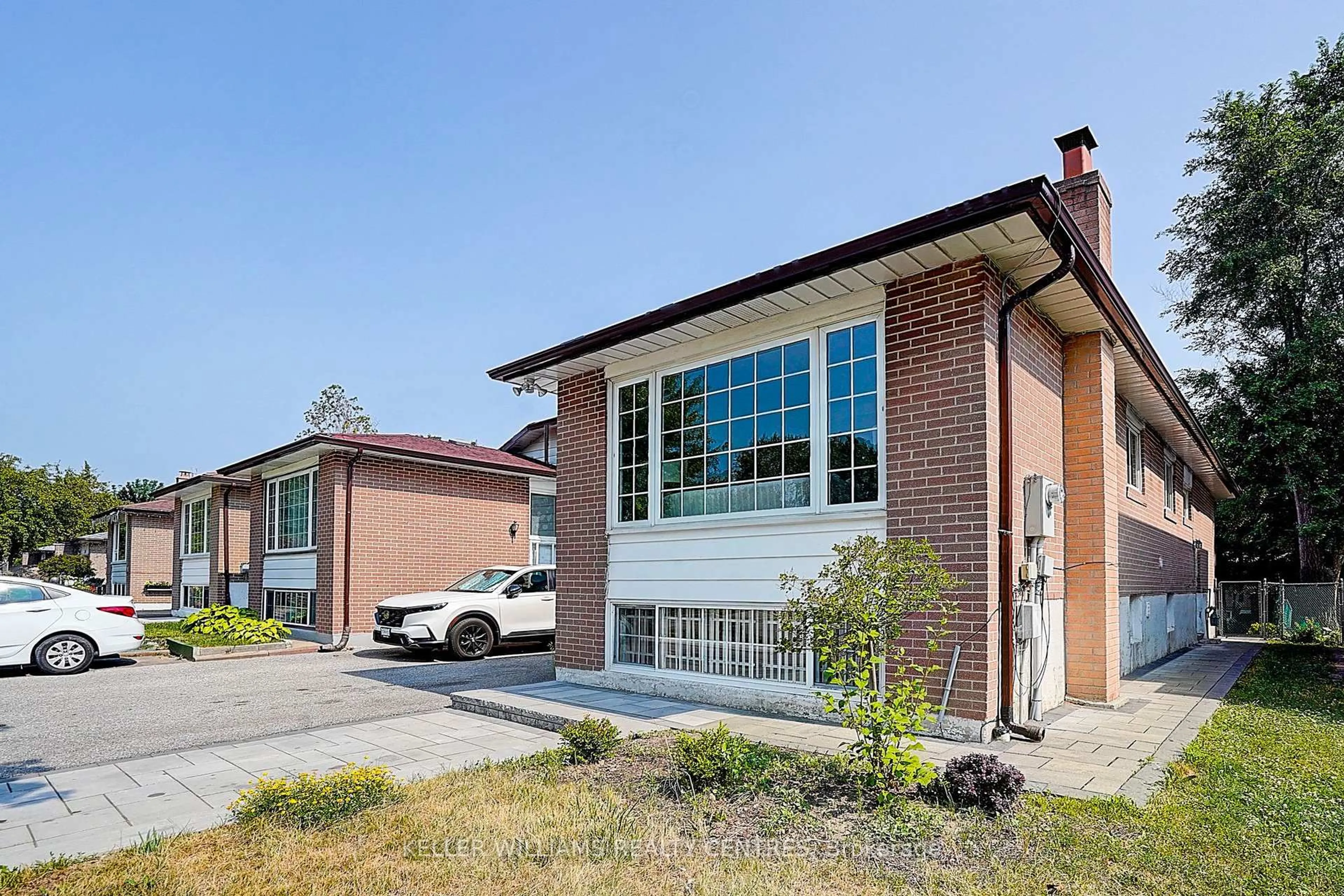 Home with brick exterior material, street for 77 Glenstroke Dr, Toronto Ontario M1S 3A1