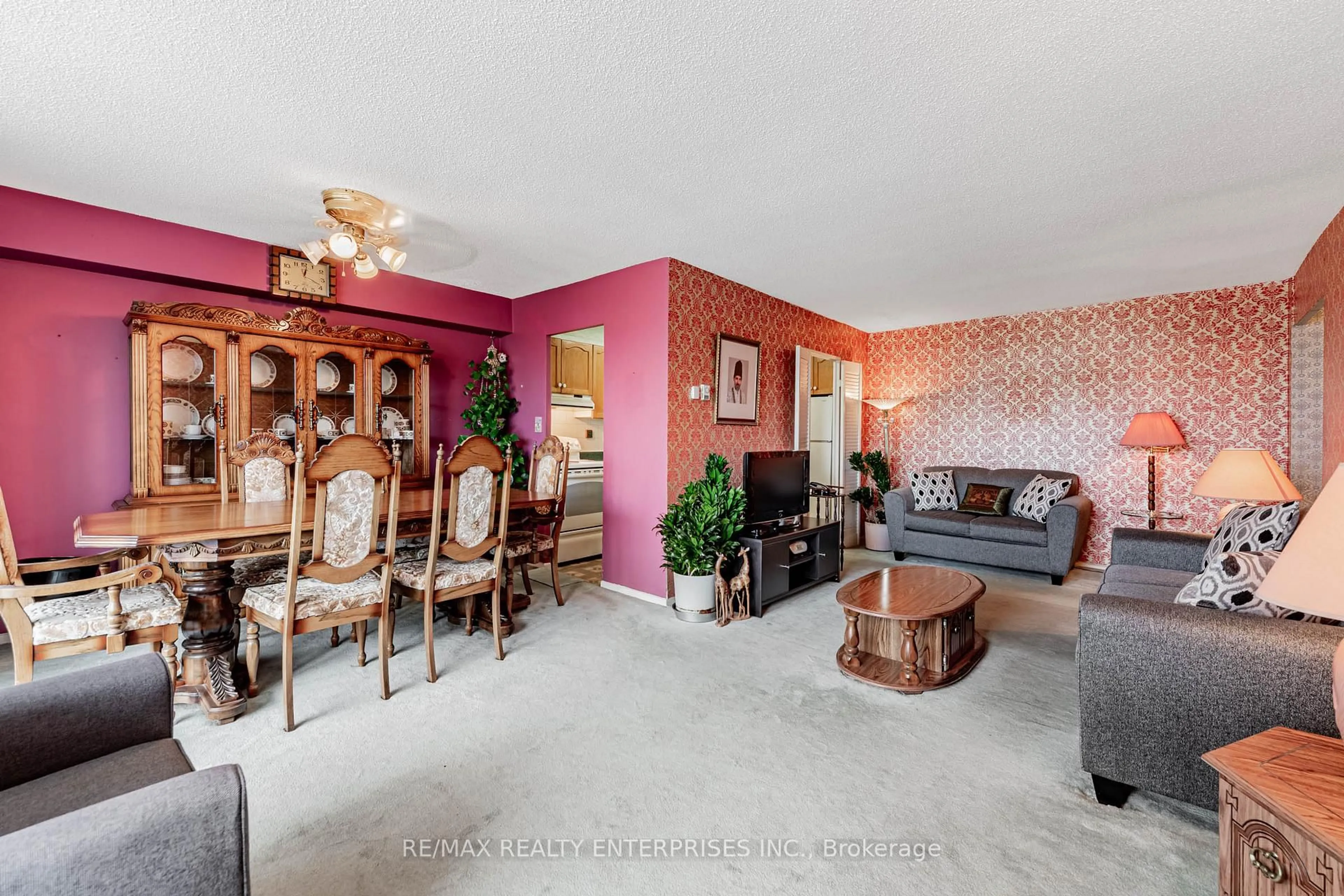 Living room with furniture, unknown for 1 Massey Sq #308, Toronto Ontario M4C 5L4