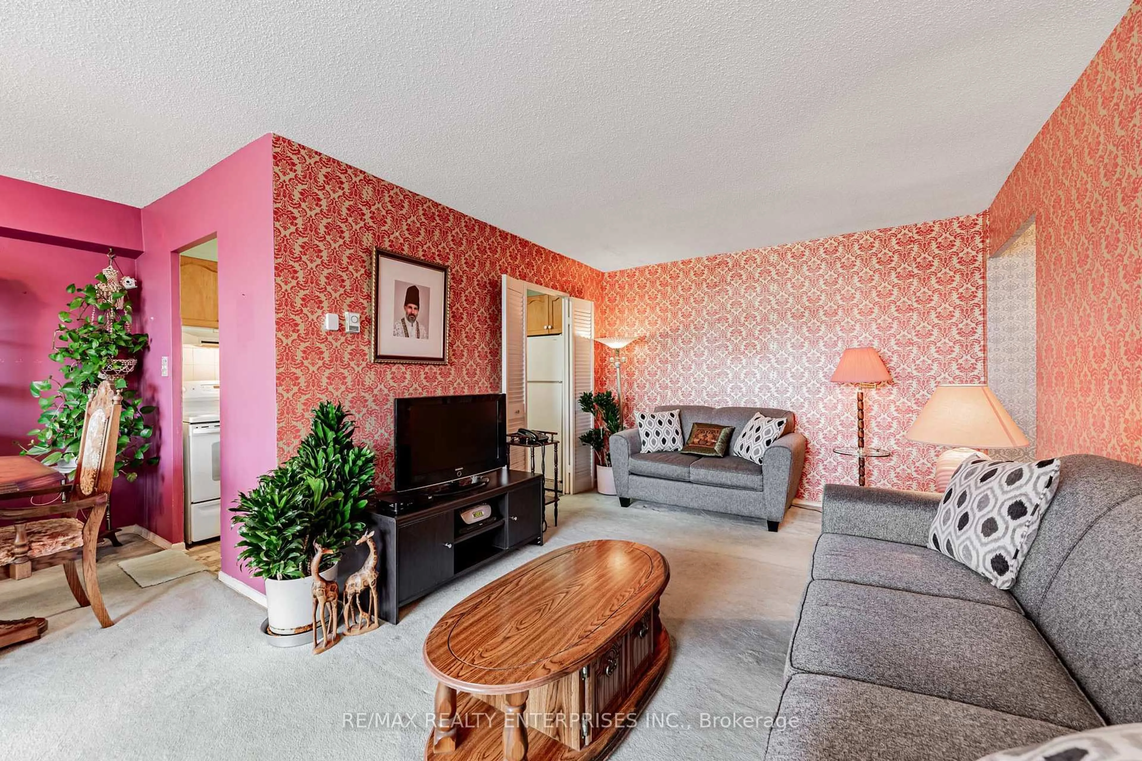 Living room with furniture, unknown for 1 Massey Sq #308, Toronto Ontario M4C 5L4