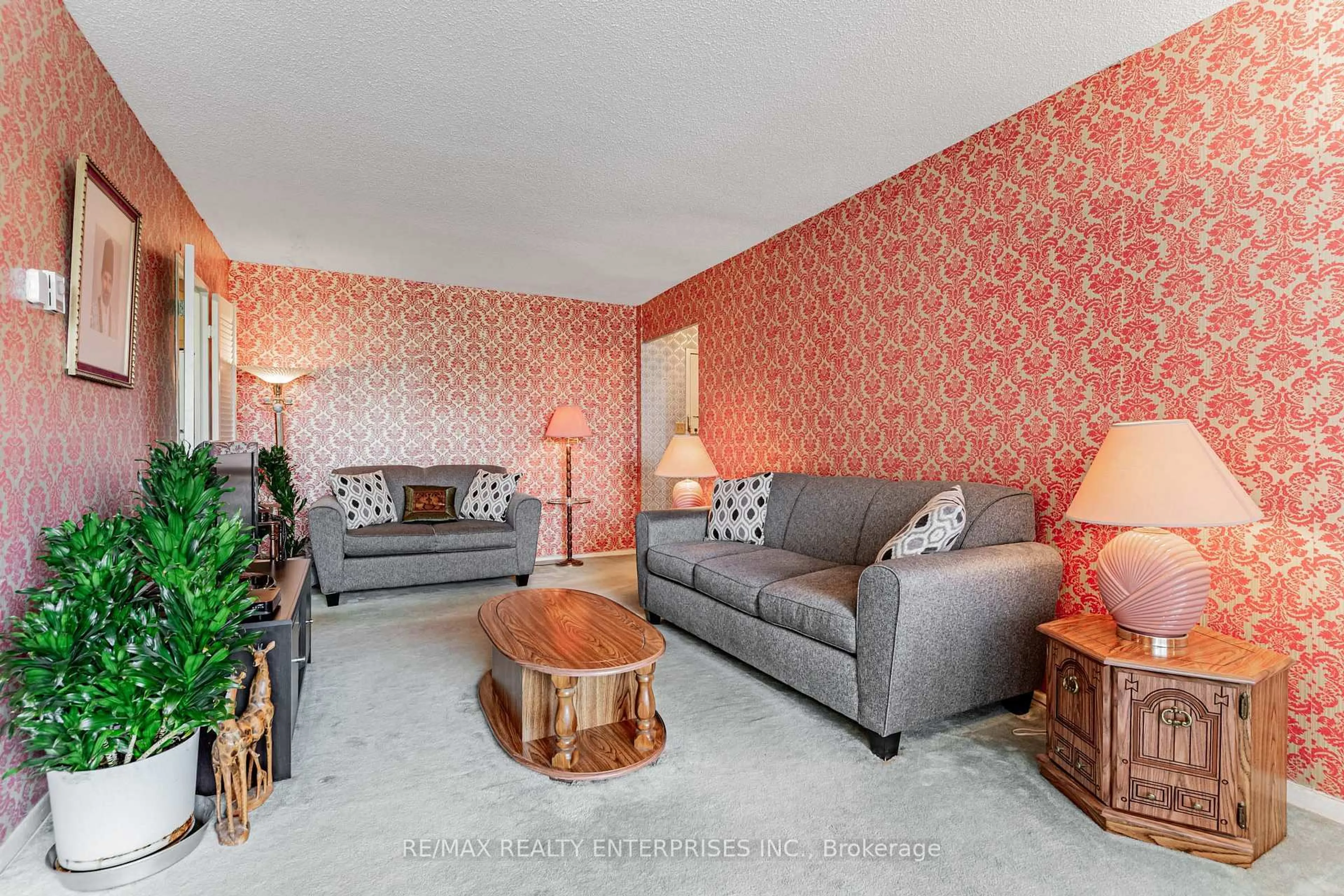 Living room with furniture, unknown for 1 Massey Sq #308, Toronto Ontario M4C 5L4