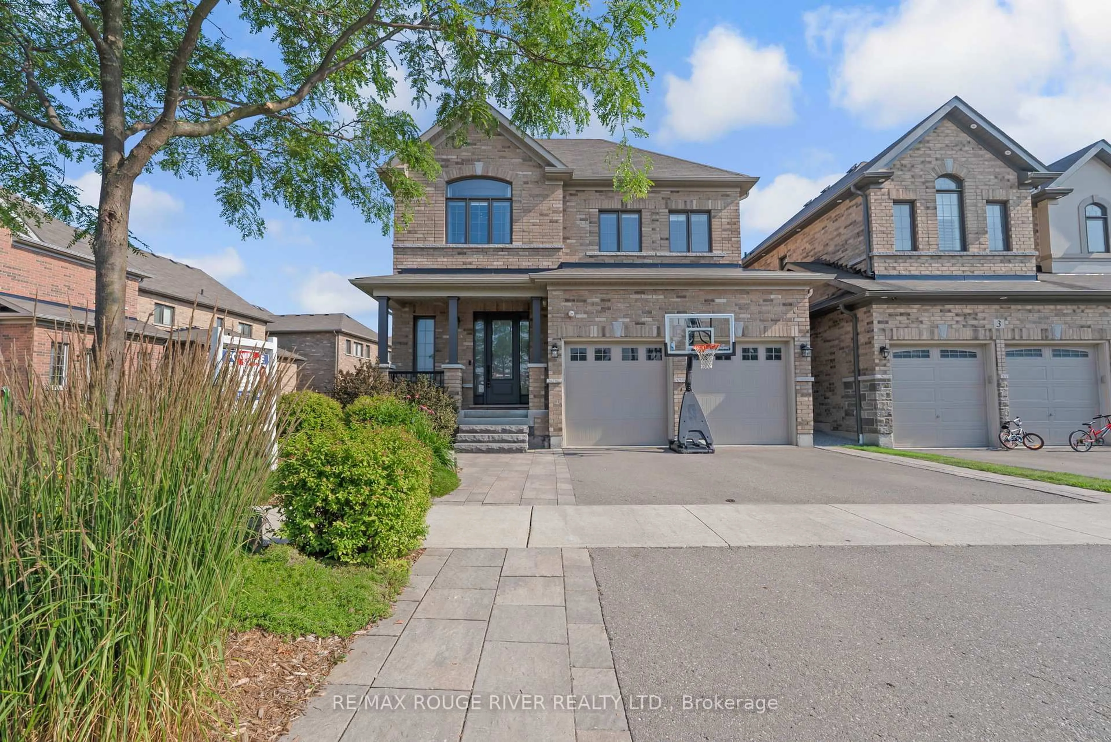 Home with brick exterior material, street for 1 Lancewood Dr, Whitby Ontario L1R 0N4