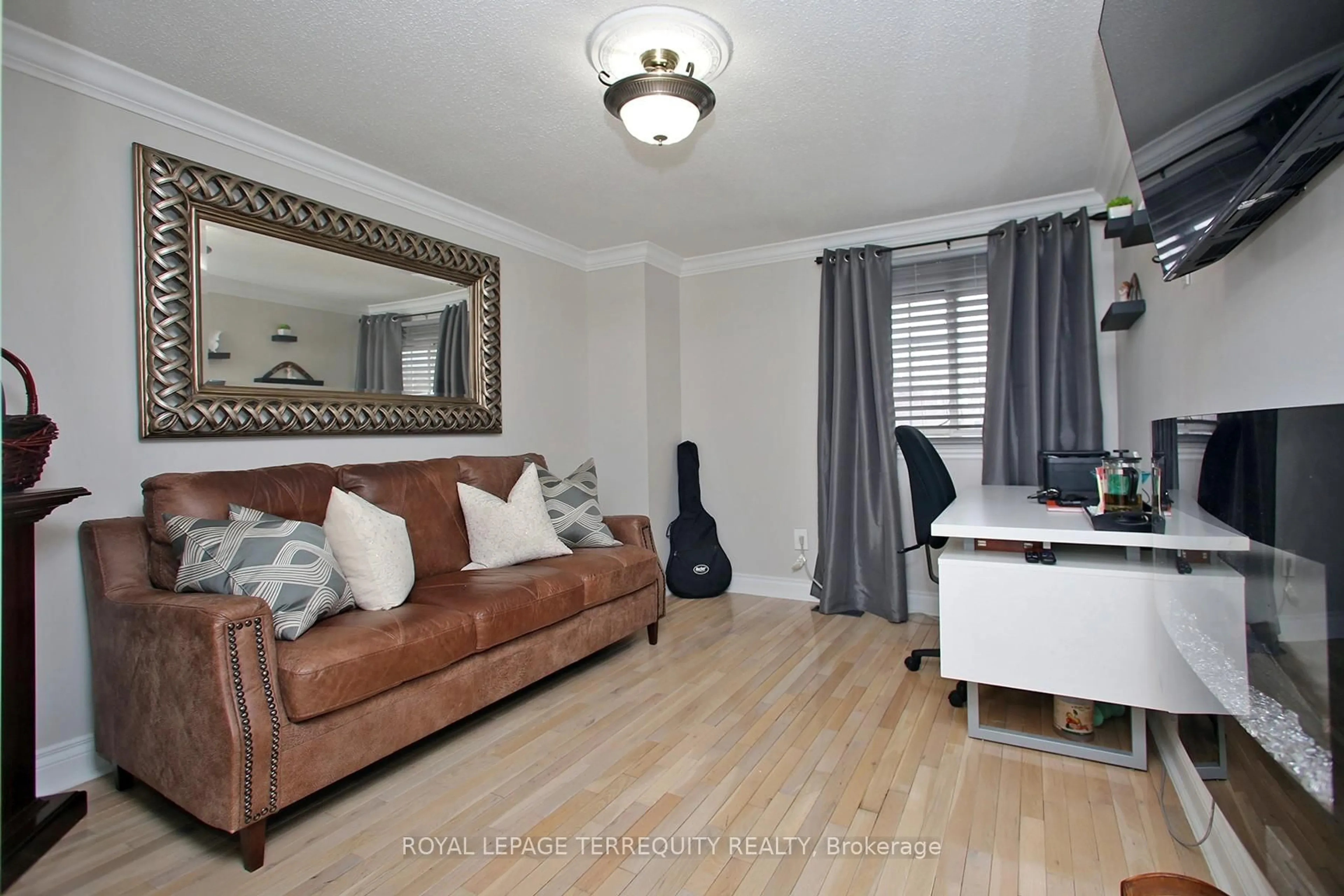 Living room with furniture, wood/laminate floor for 40 Large Cres, Ajax Ontario L1T 2S9