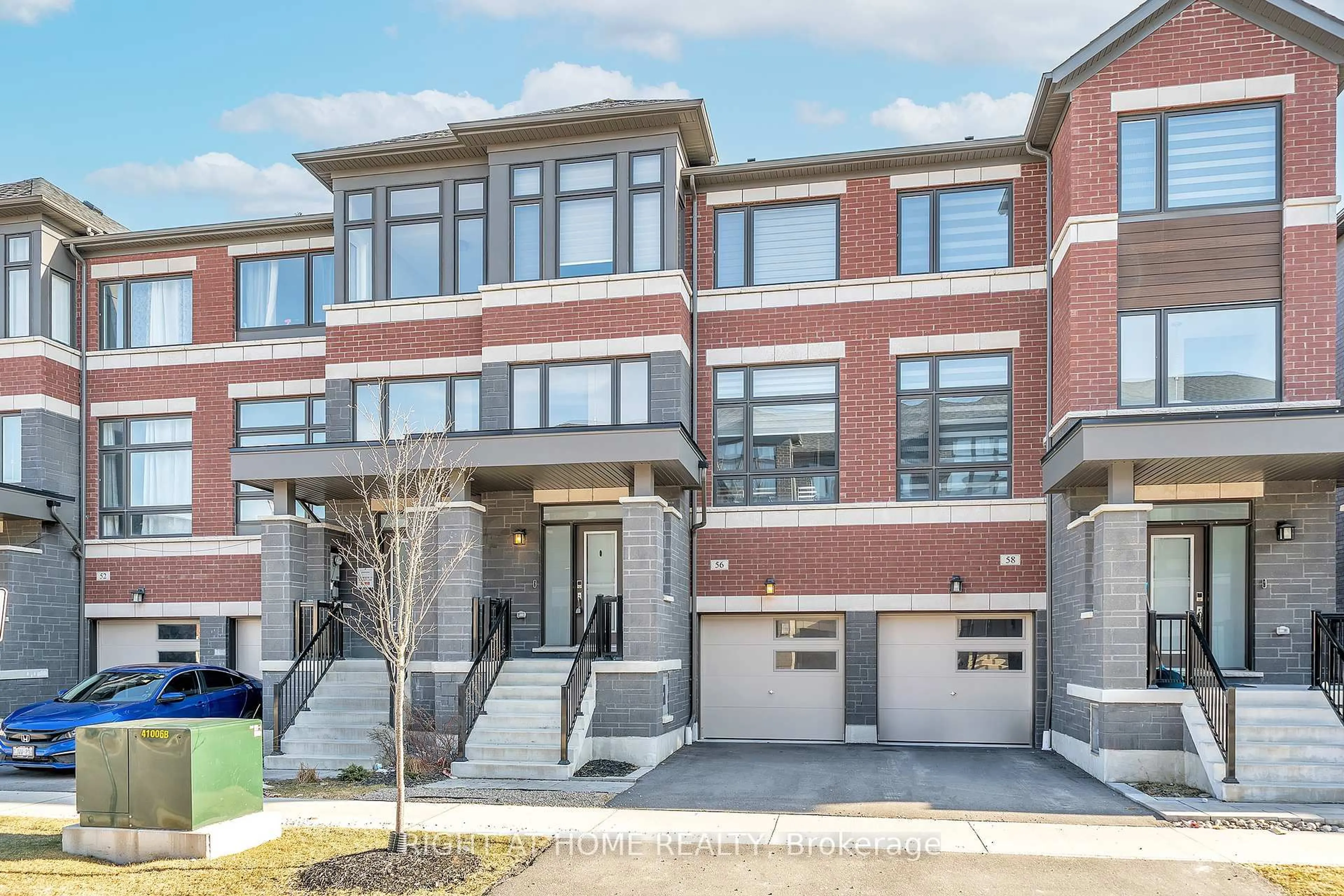 Home with brick exterior material, street for 56 Douet Lane, Ajax Ontario L1Z 0V4