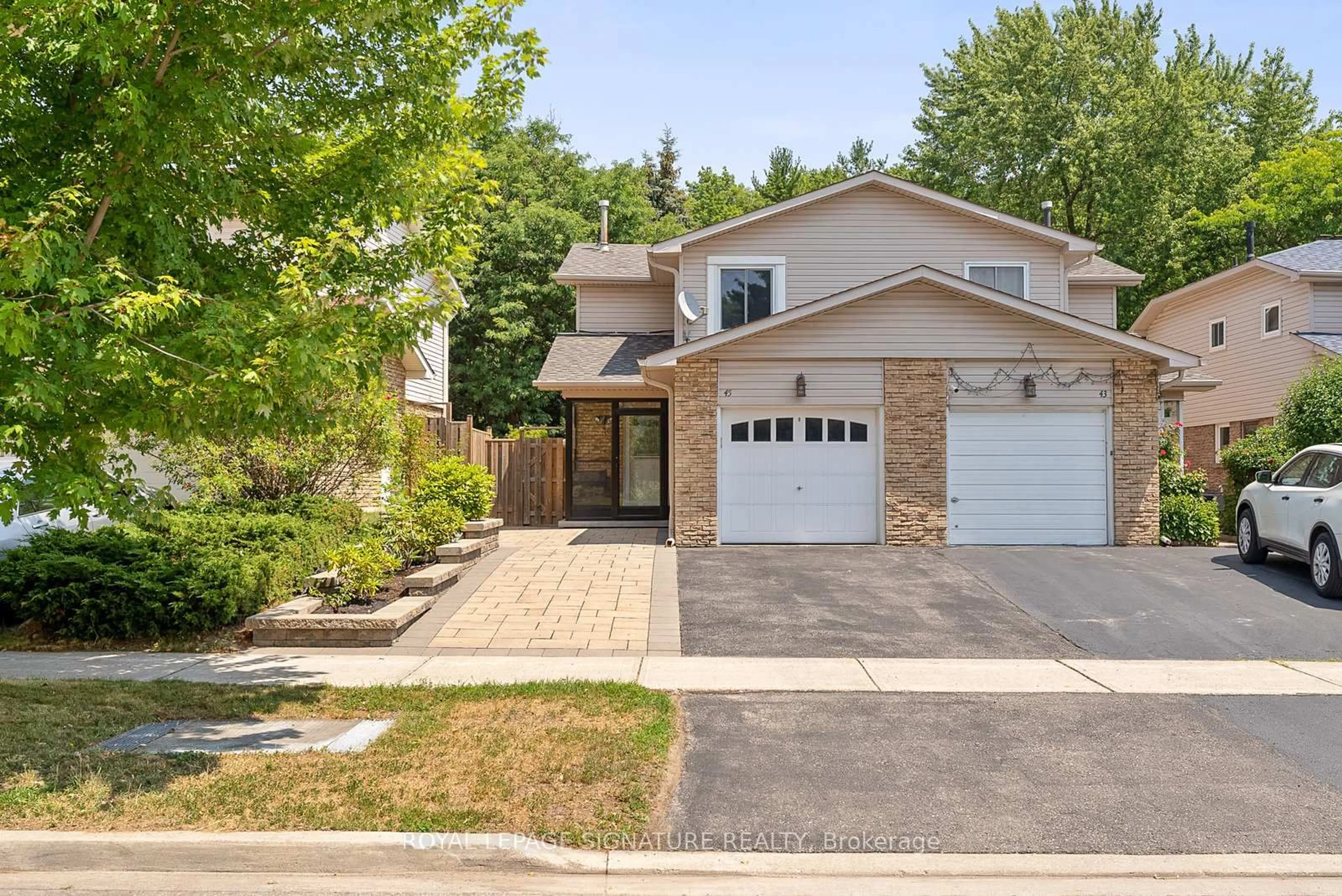 Home with brick exterior material, street for 45 Montezuma Tr, Toronto Ontario M1V 1K4